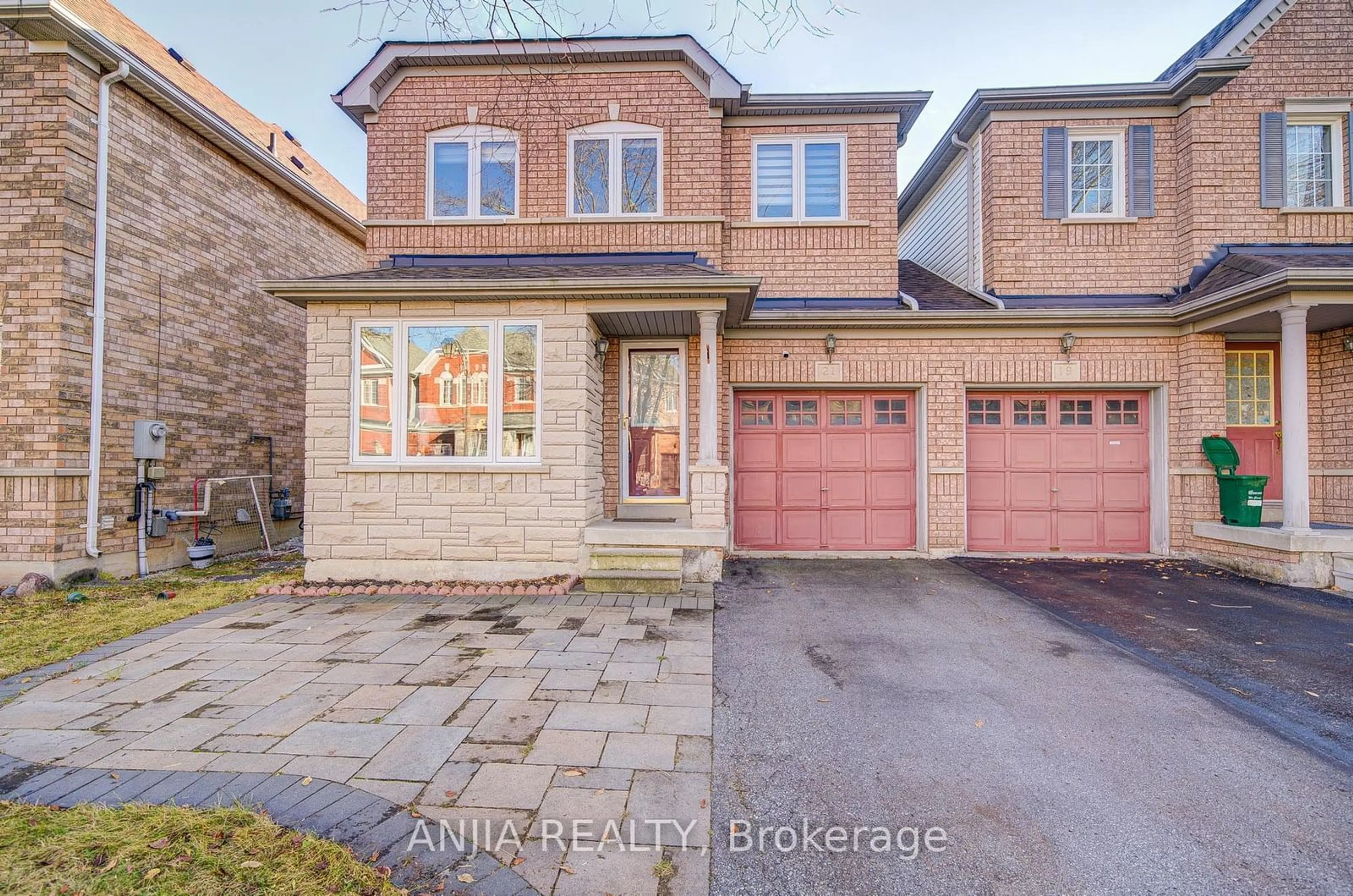 Home with brick exterior material for 21 Bertram Earnshaw Dr, Markham Ontario L6C 2R8