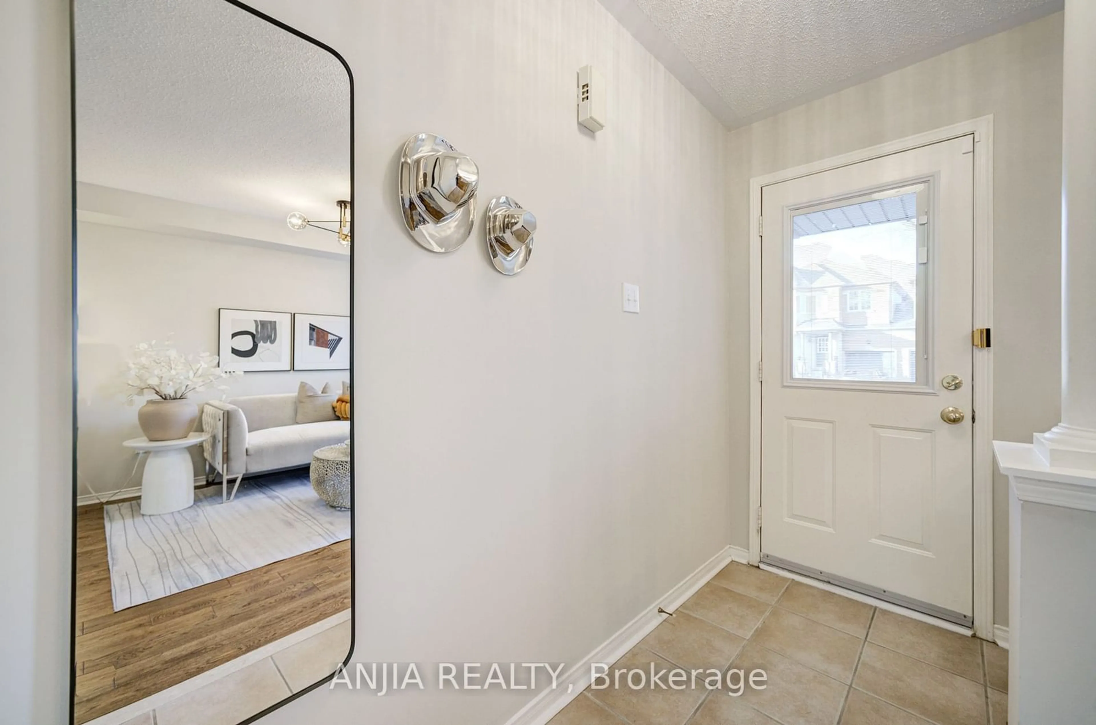 Indoor entryway, wood floors for 21 Bertram Earnshaw Dr, Markham Ontario L6C 2R8