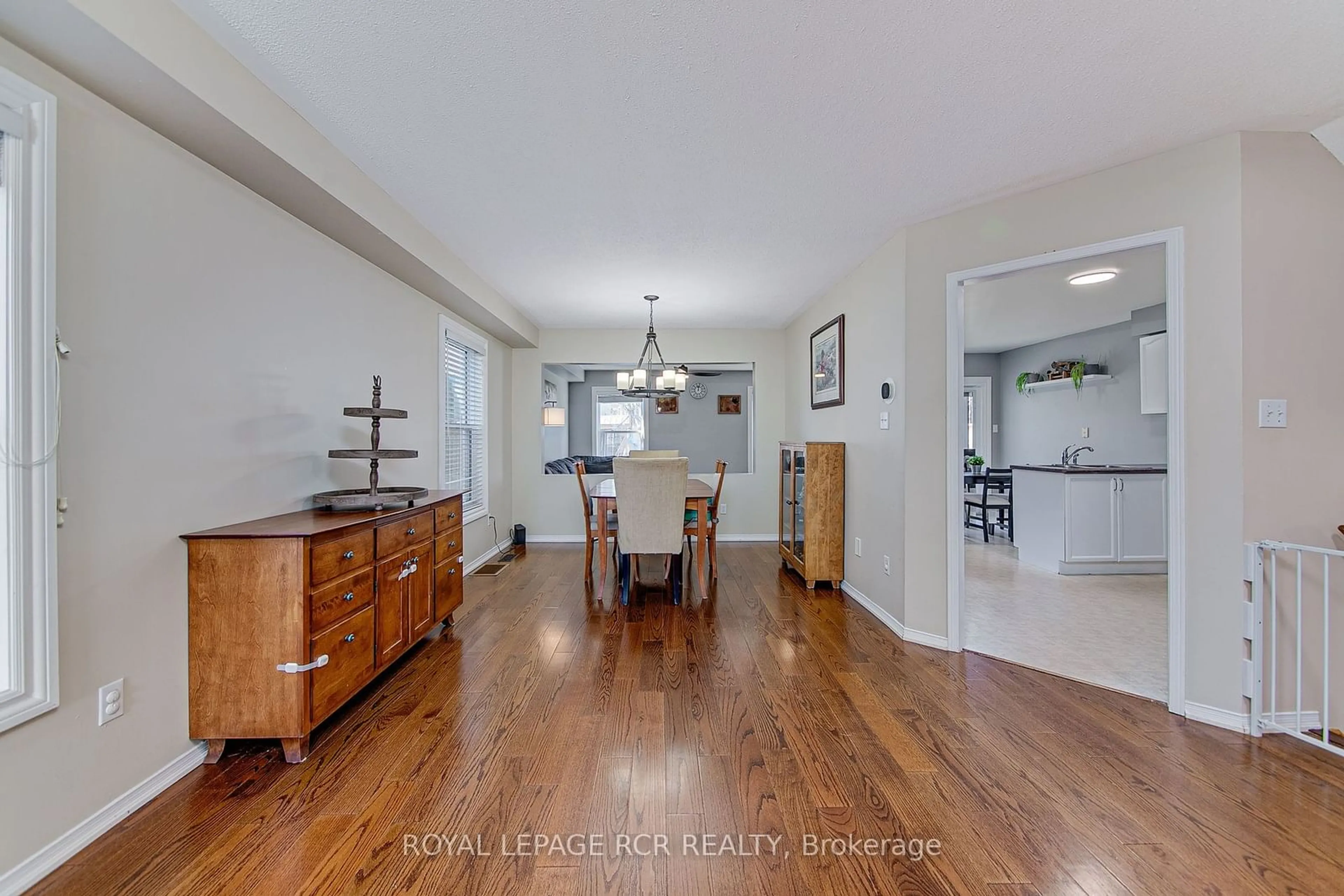 Dining room, wood floors, the street view for 52 Mccurdy Dr, New Tecumseth Ontario L0G 1W0