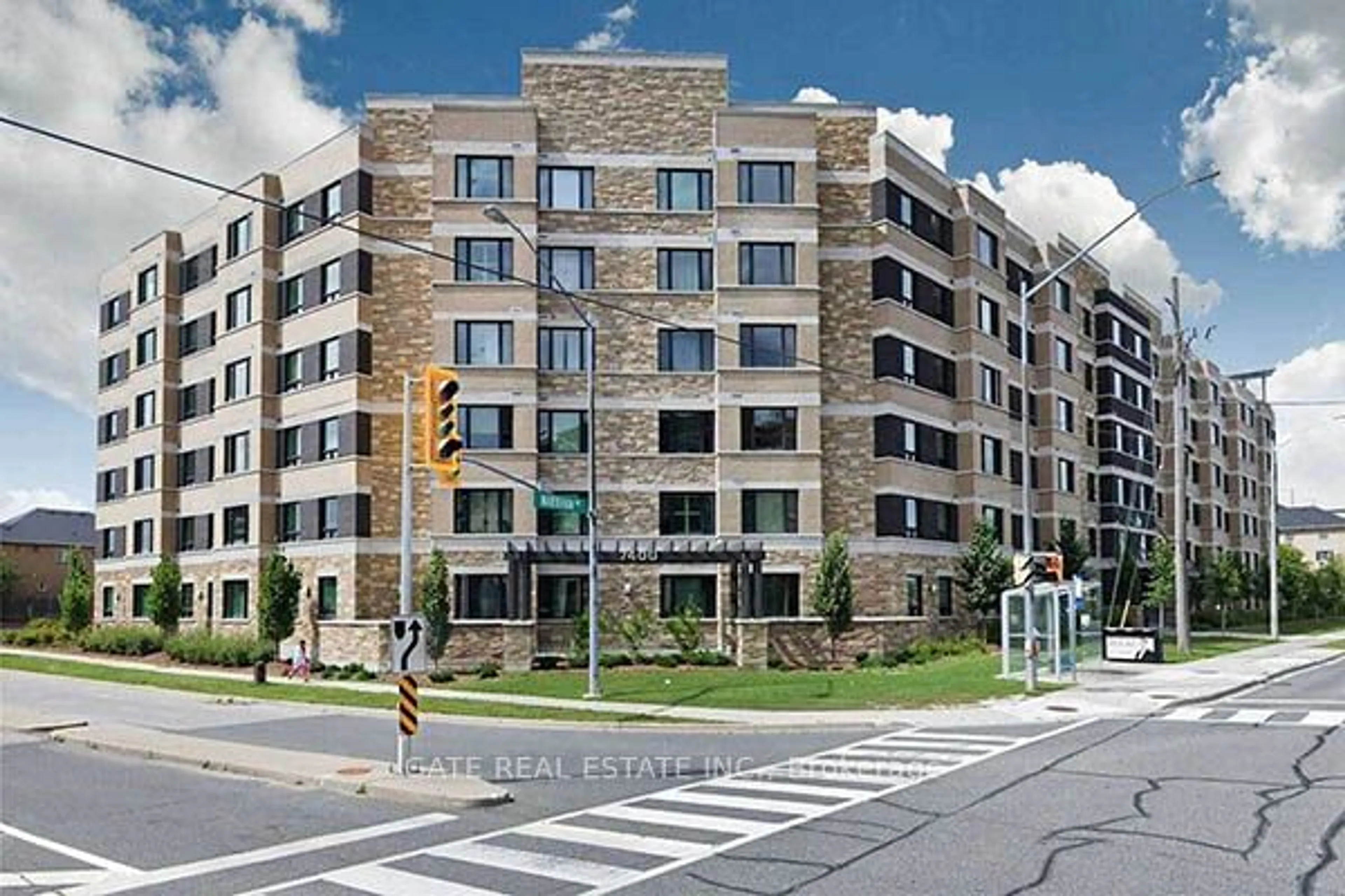 A pic from exterior of the house or condo, the front or back of building for 7400 Markham Rd #306, Markham Ontario L3S 0C5