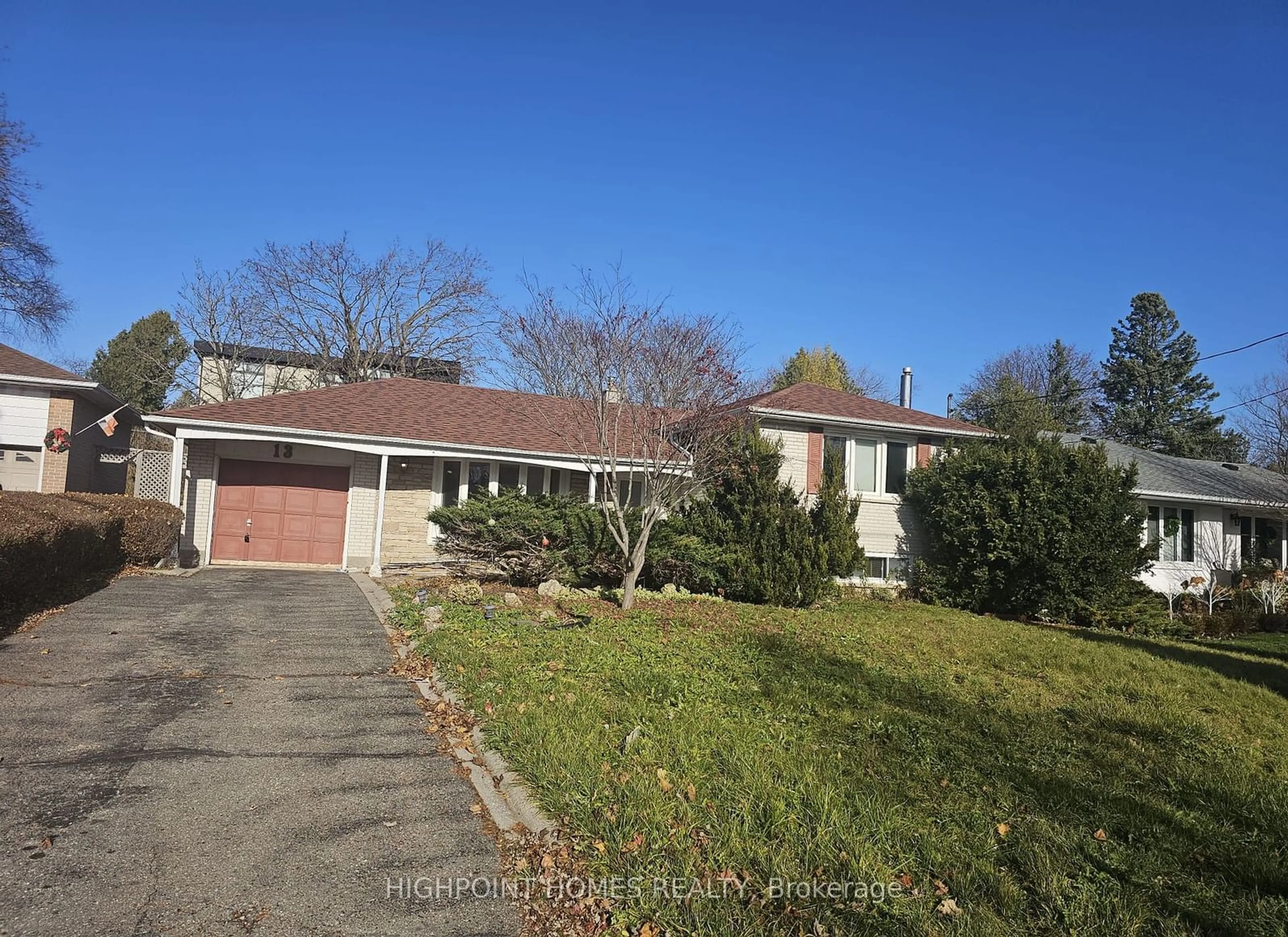 Frontside or backside of a home, the street view for 13 Sherwood Forest Dr, Markham Ontario L3P 1P5