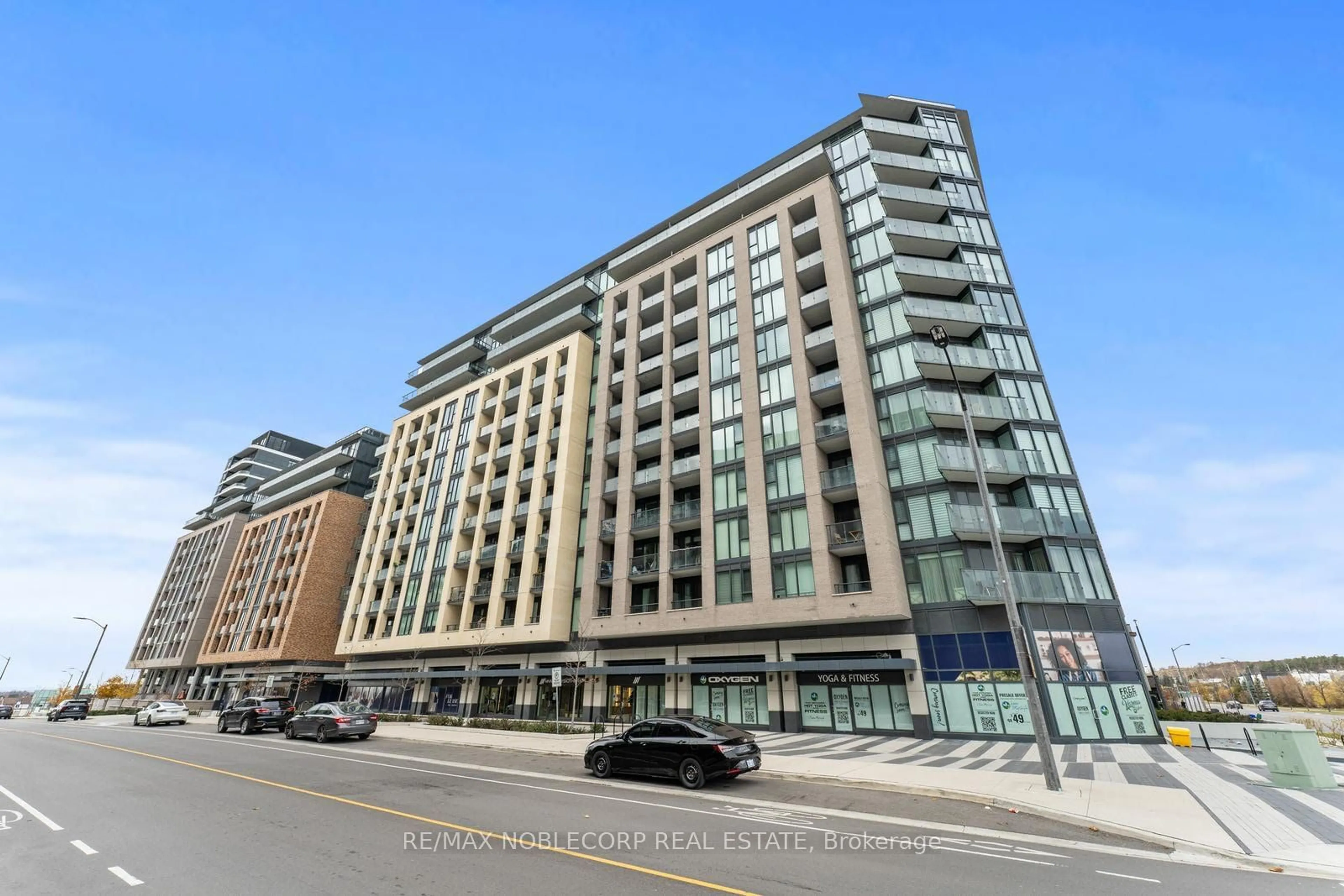 A pic from exterior of the house or condo, the street view for 100 Eagle Rock Way #313, Vaughan Ontario L6A 5B9