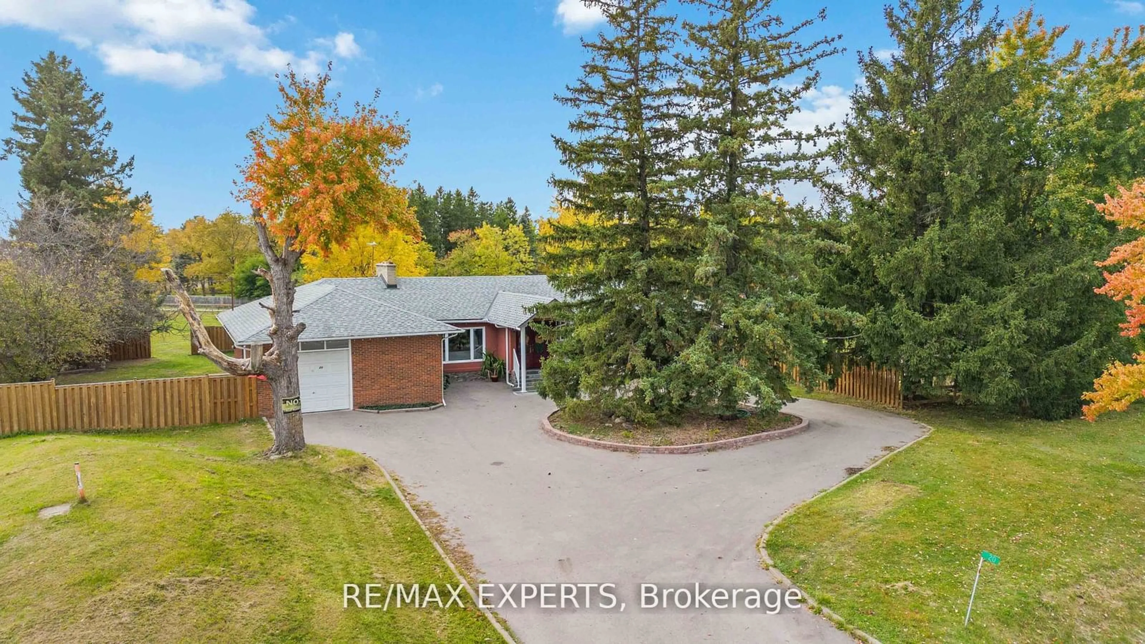 Frontside or backside of a home, the fenced backyard for 20 Leonard Rd, King Ontario L0G 1T0