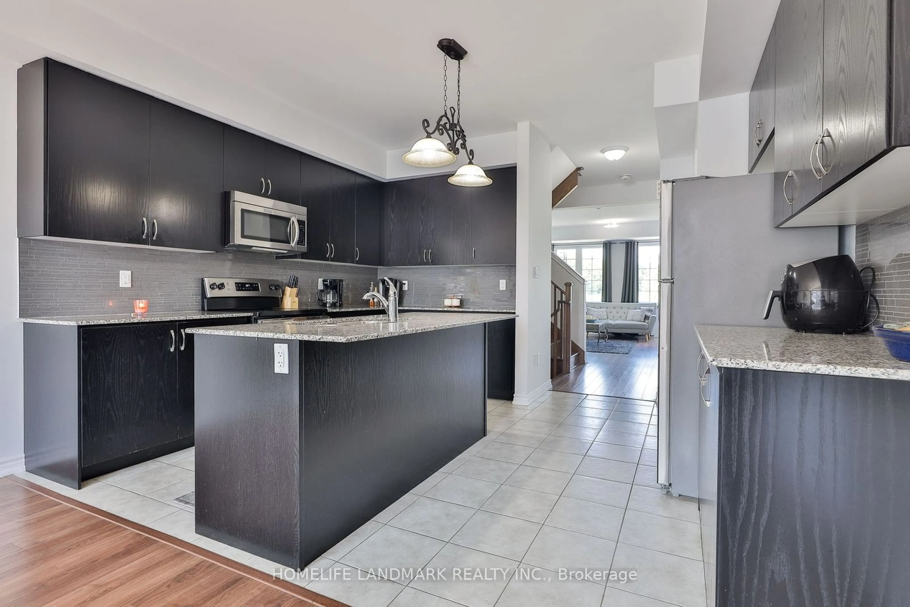 Open concept kitchen for 153 Rustle Woods Ave, Markham Ontario L6B 1A8