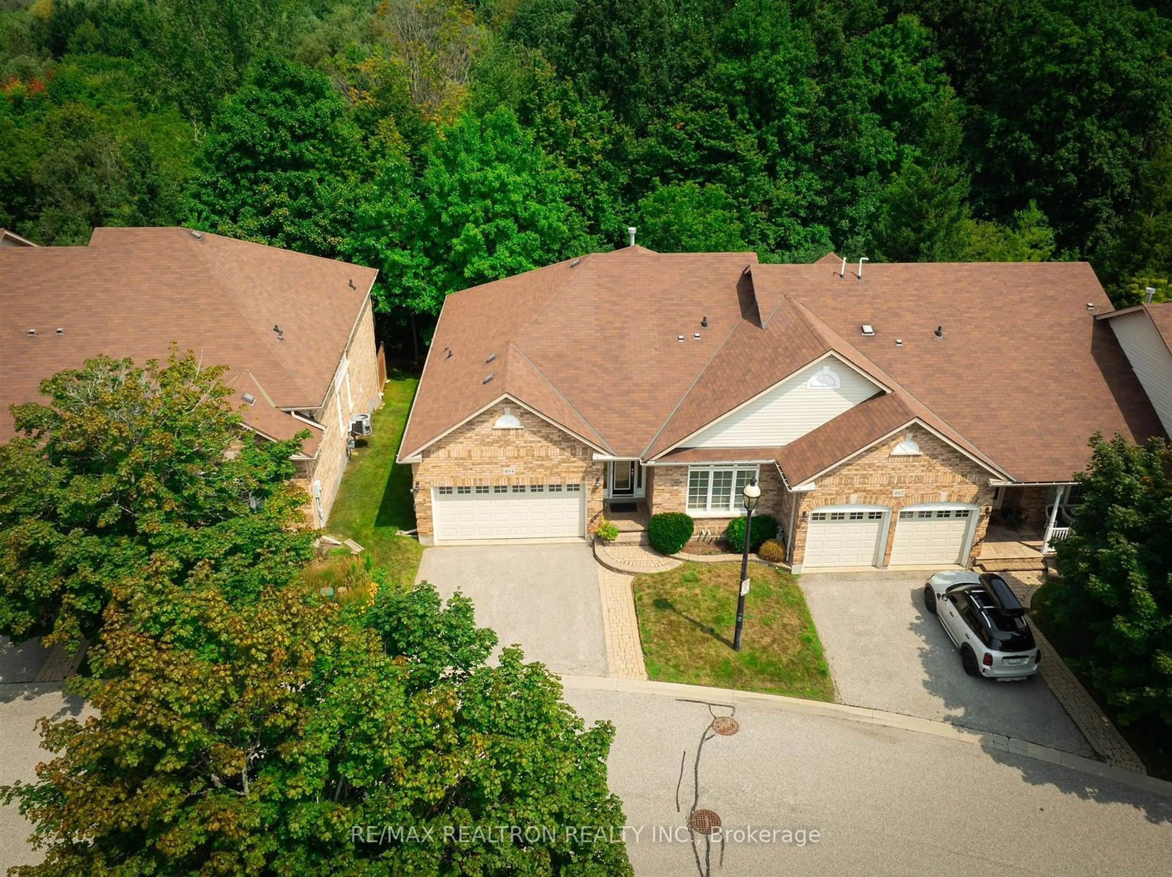 Frontside or backside of a home, the street view for 404 Morley Cook Cres, Newmarket Ontario L3X 2M3