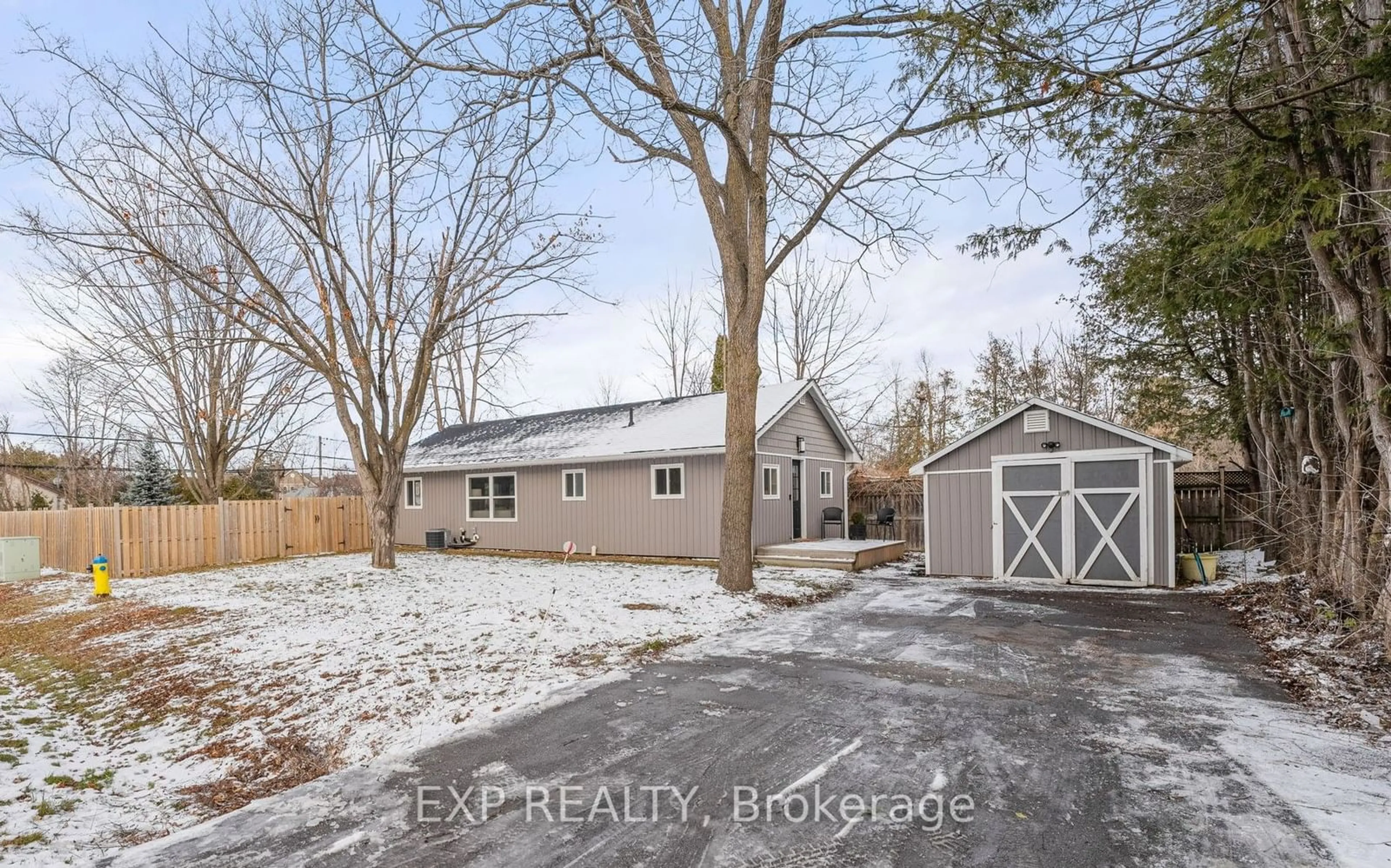 Frontside or backside of a home, the fenced backyard for 1971 Metro Rd, Georgina Ontario L0E 1L0