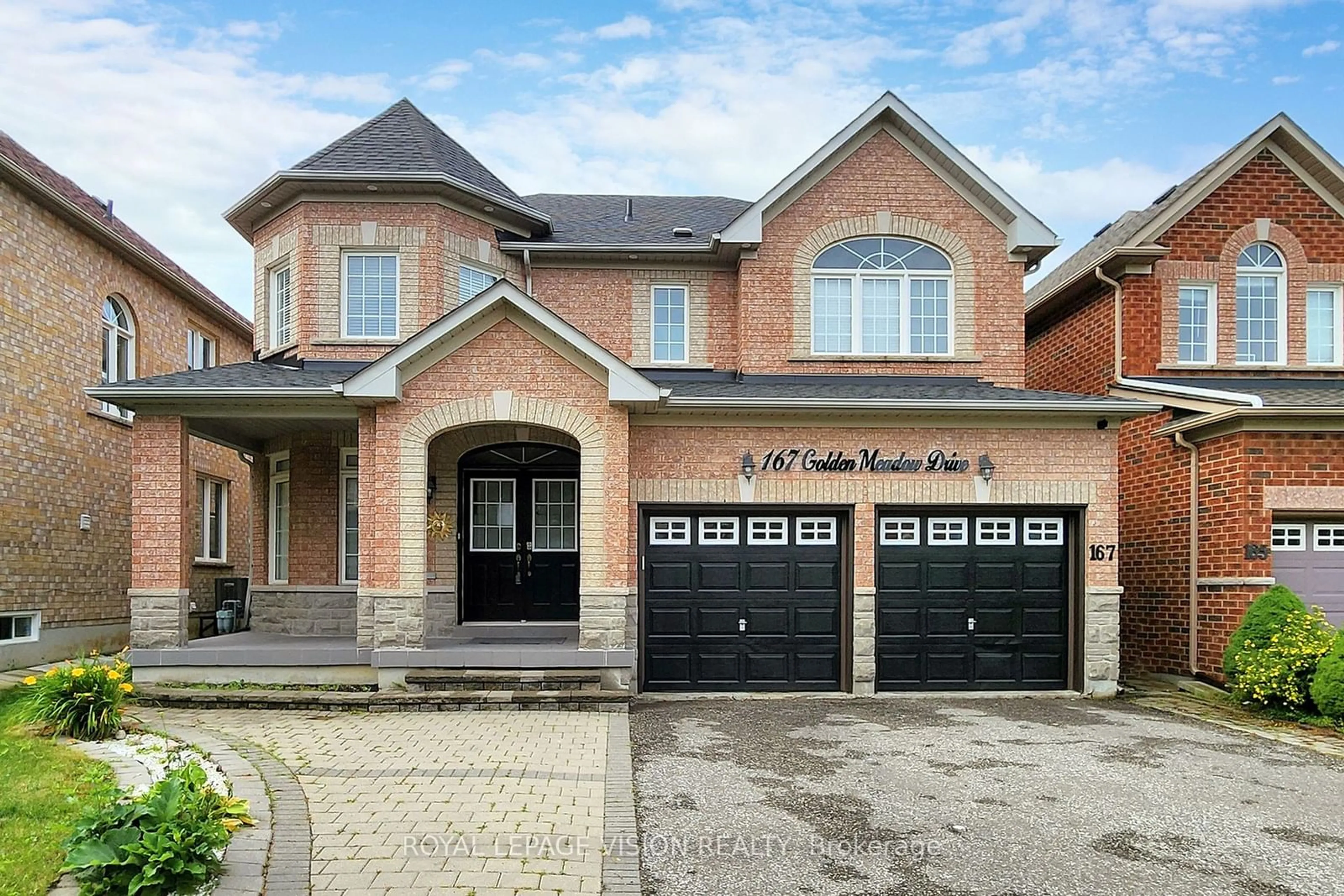 Home with brick exterior material for 167 Golden Meadow Dr, Markham Ontario L6E 1E2