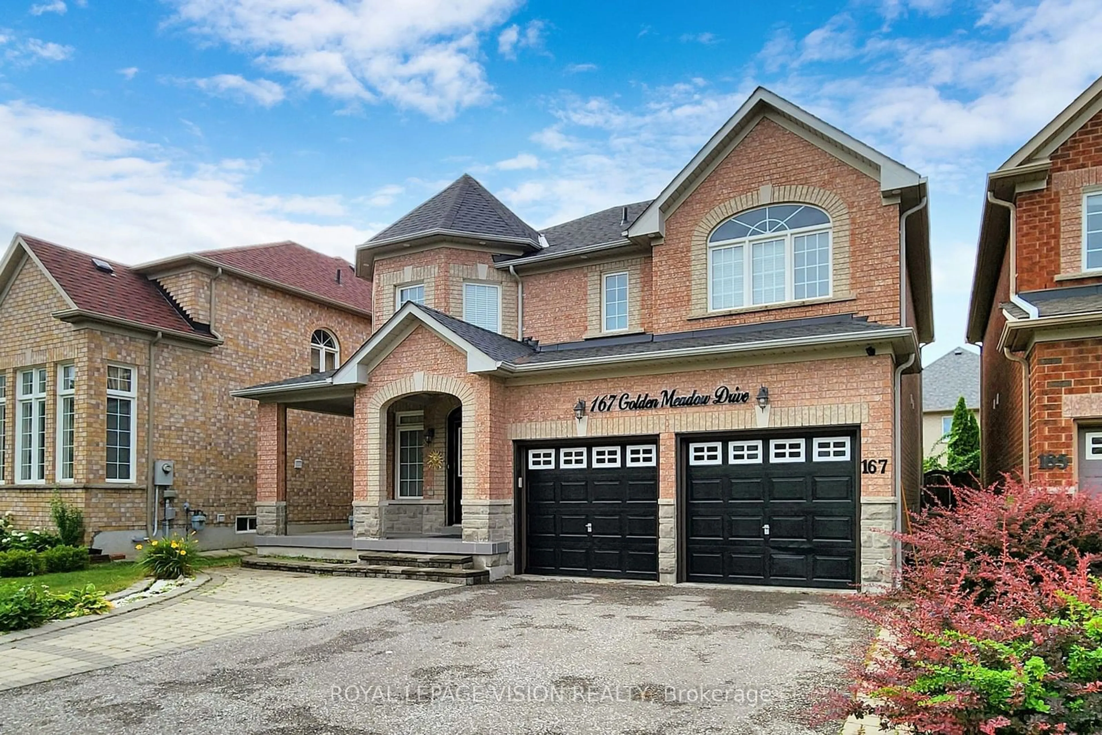 Home with brick exterior material for 167 Golden Meadow Dr, Markham Ontario L6E 1E2