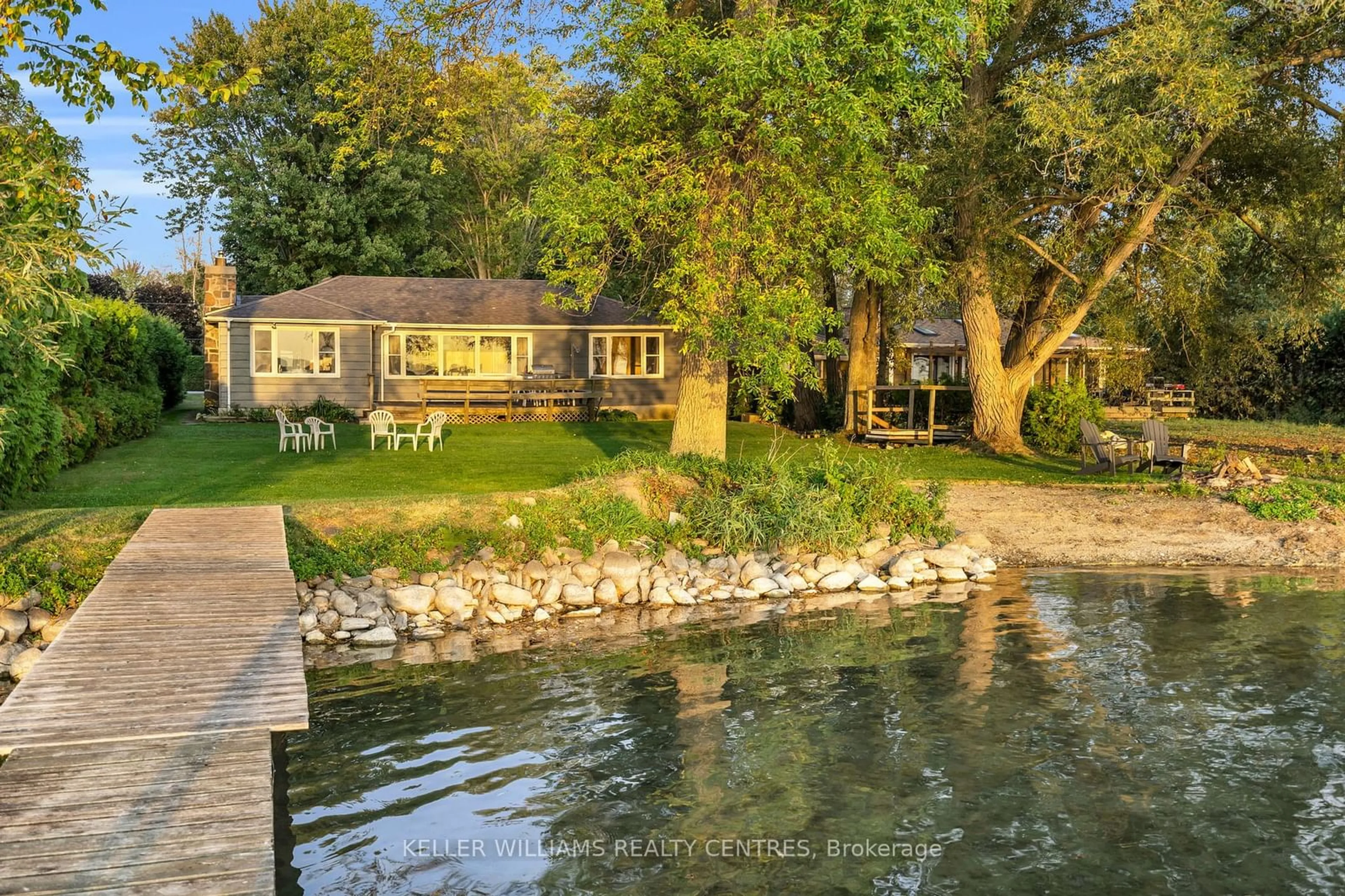 A pic from outside/outdoor area/front of a property/back of a property/a pic from drone, water/lake/river/ocean view for 28 McRae Beach Rd, Georgina Ontario L0E 1N0