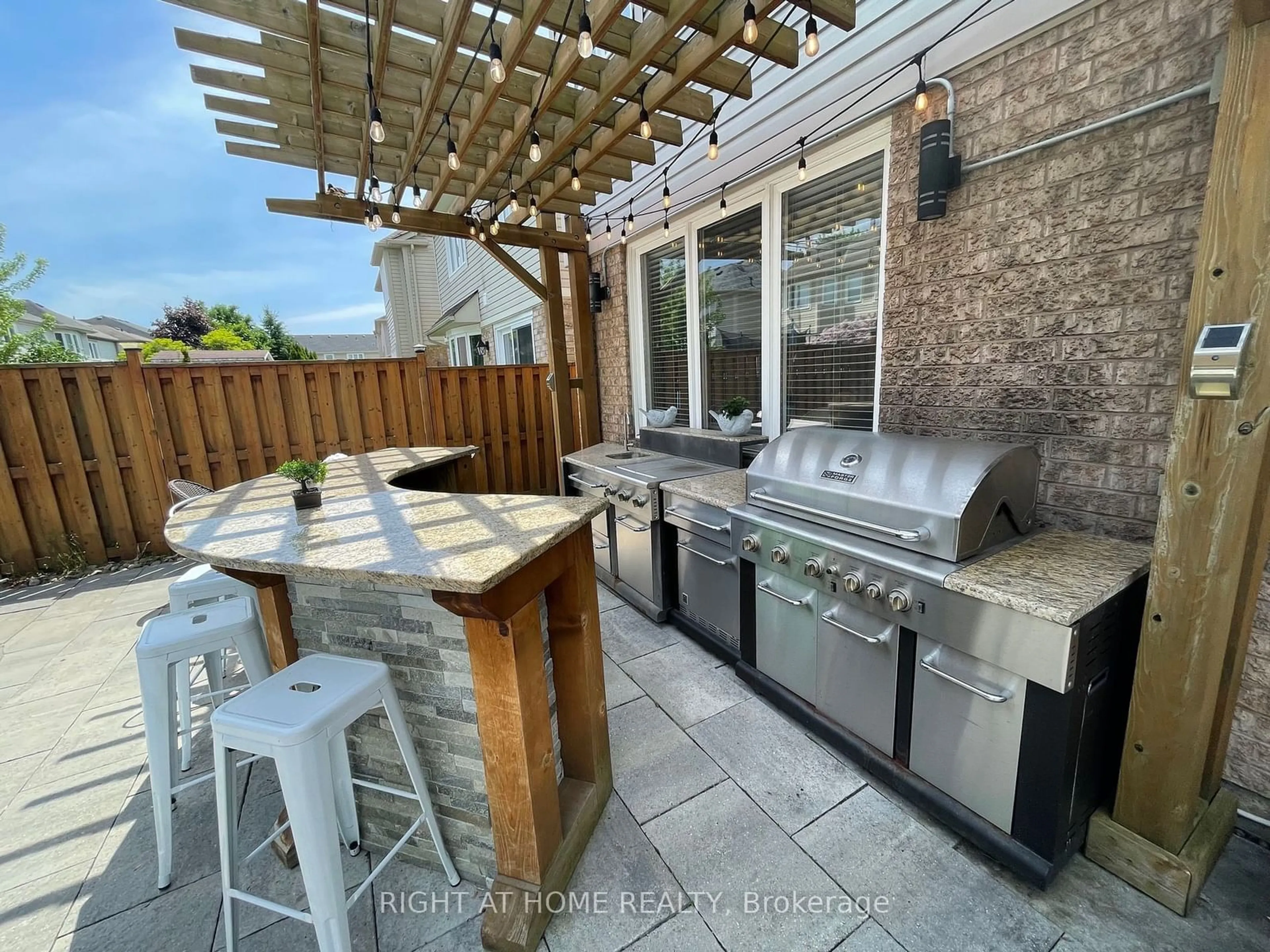 Patio, the fenced backyard for 58 Dunning Dr, New Tecumseth Ontario L9R 0B5