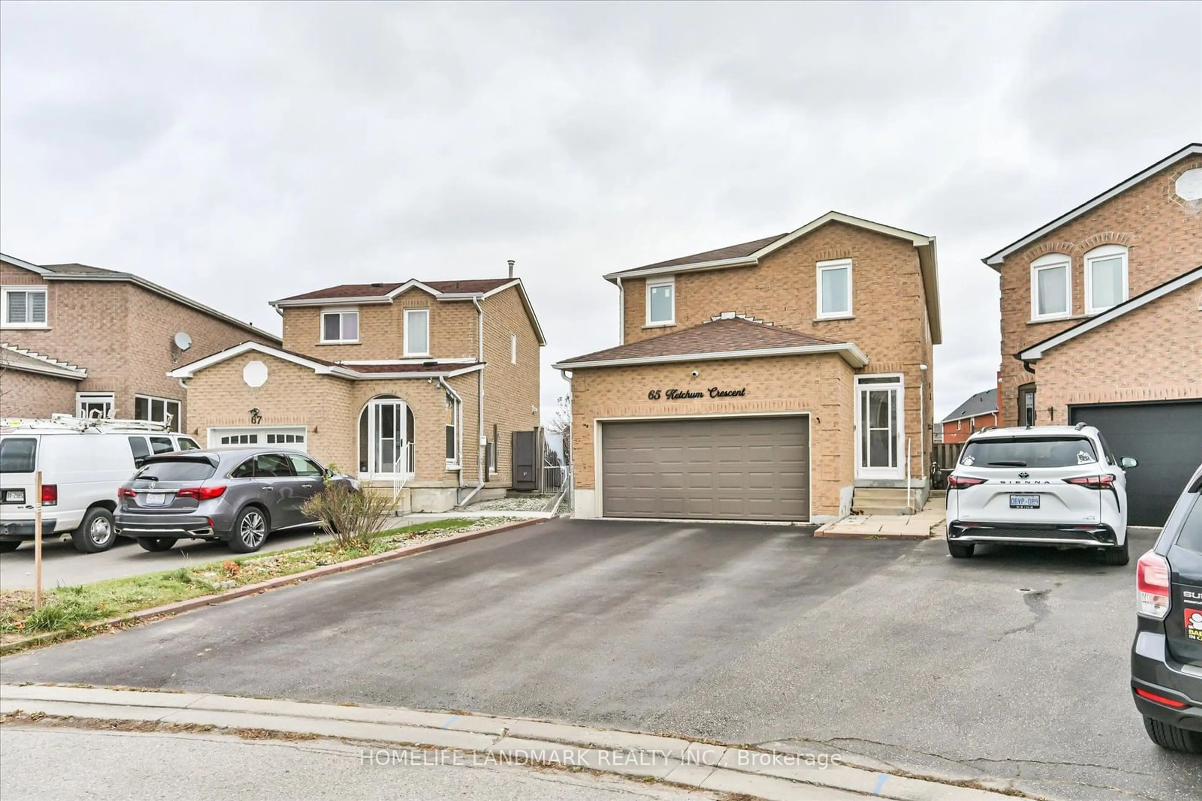 Frontside or backside of a home, the street view for 65 Ketchum Cres, Markham Ontario L3S 3G3