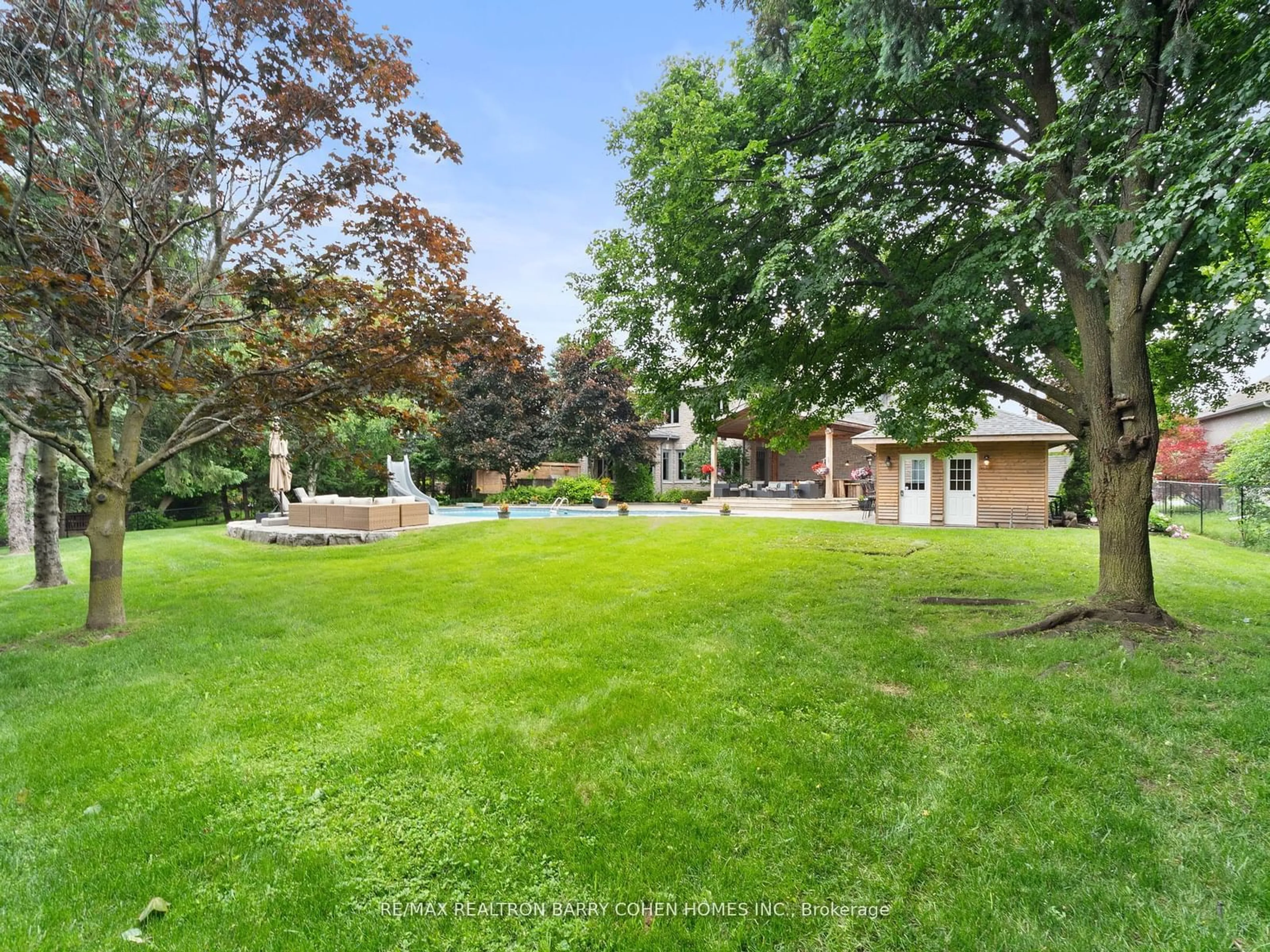 Frontside or backside of a home, the fenced backyard for 157 Treegrove Circ, Aurora Ontario L4G 6M1