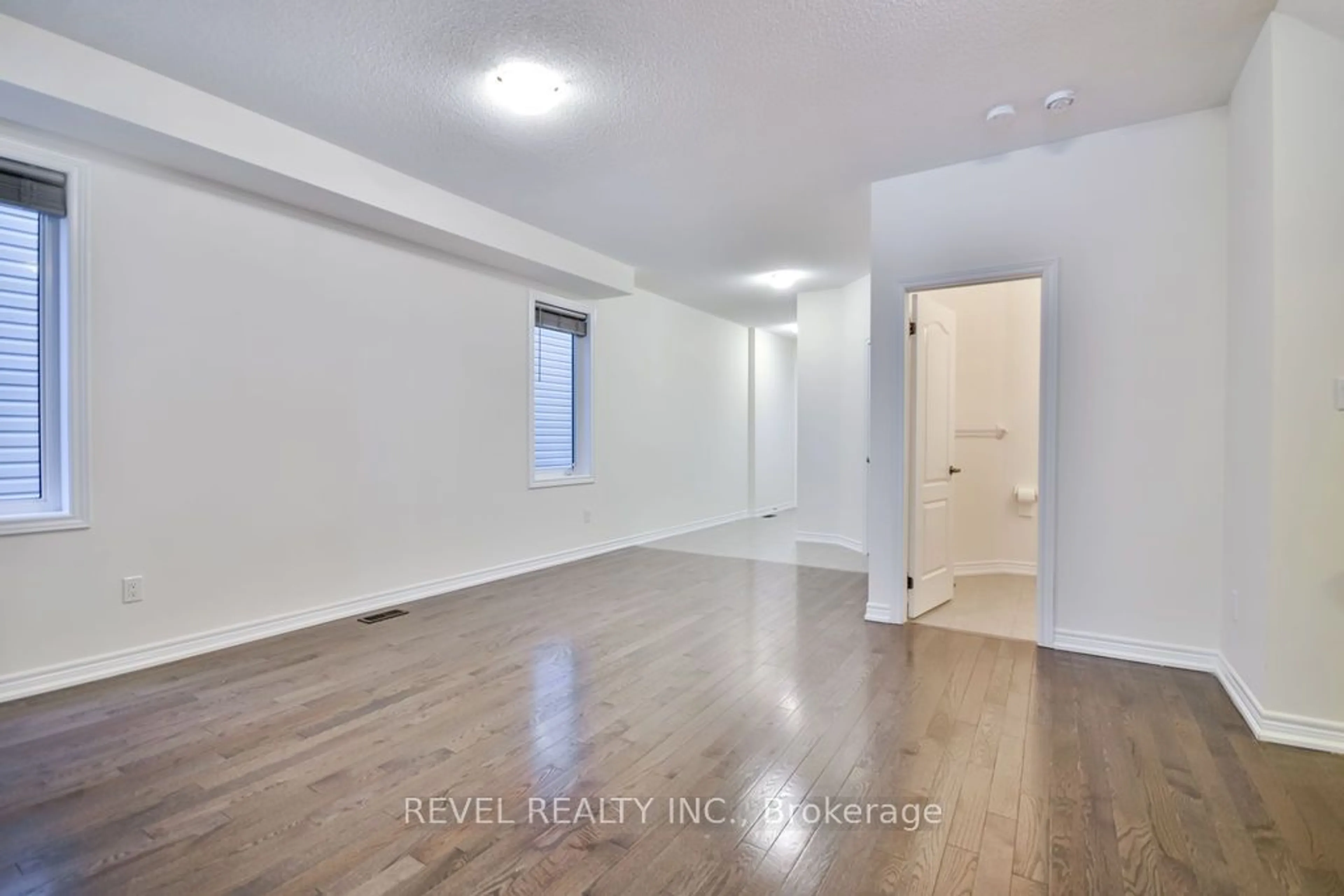 A pic of a room, wood floors for 40 Sasco Way, Essa Ontario L0M 1B4