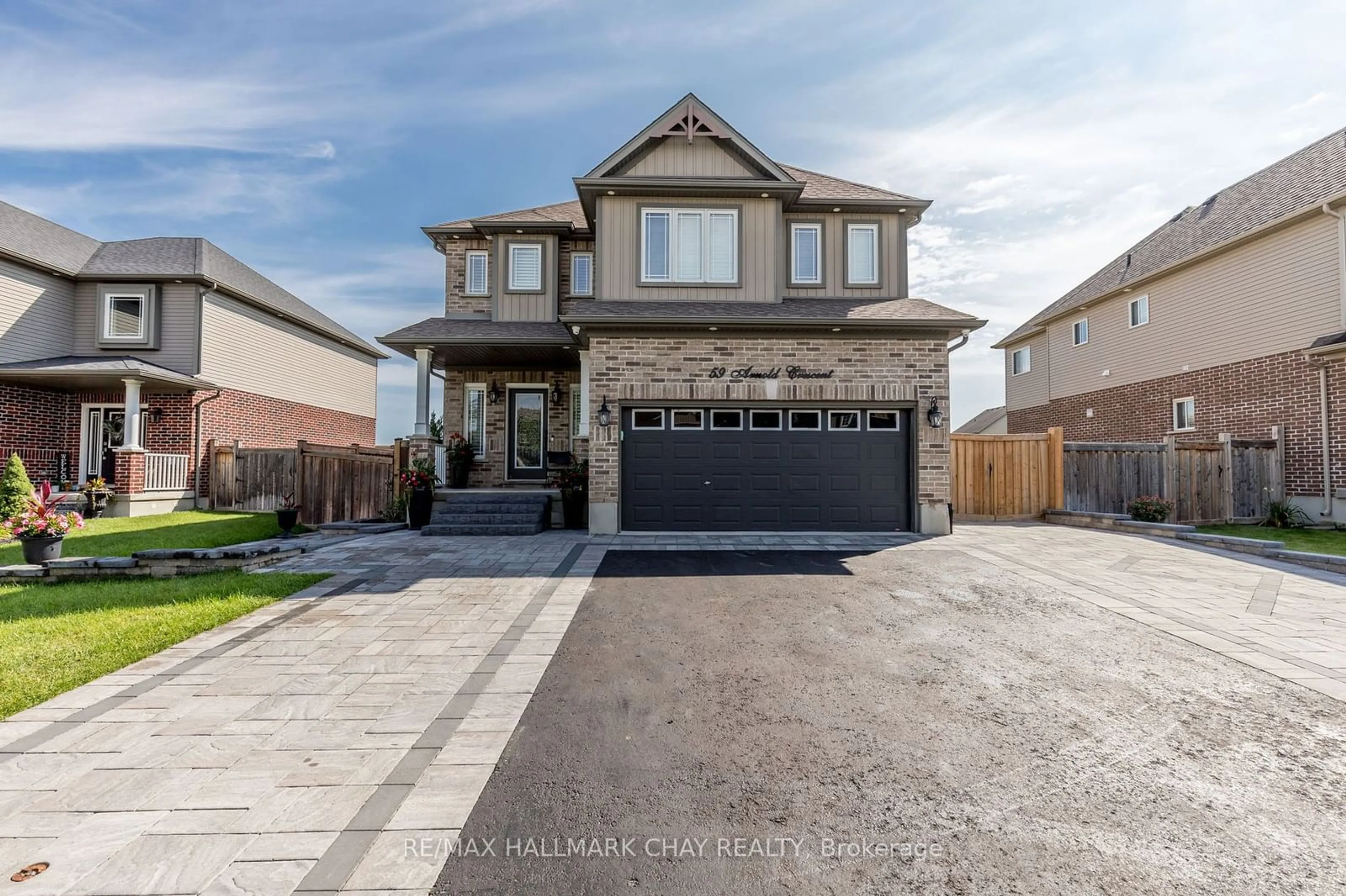 Frontside or backside of a home, the street view for 59 Arnold Cres, Essa Ontario L0M 1B6