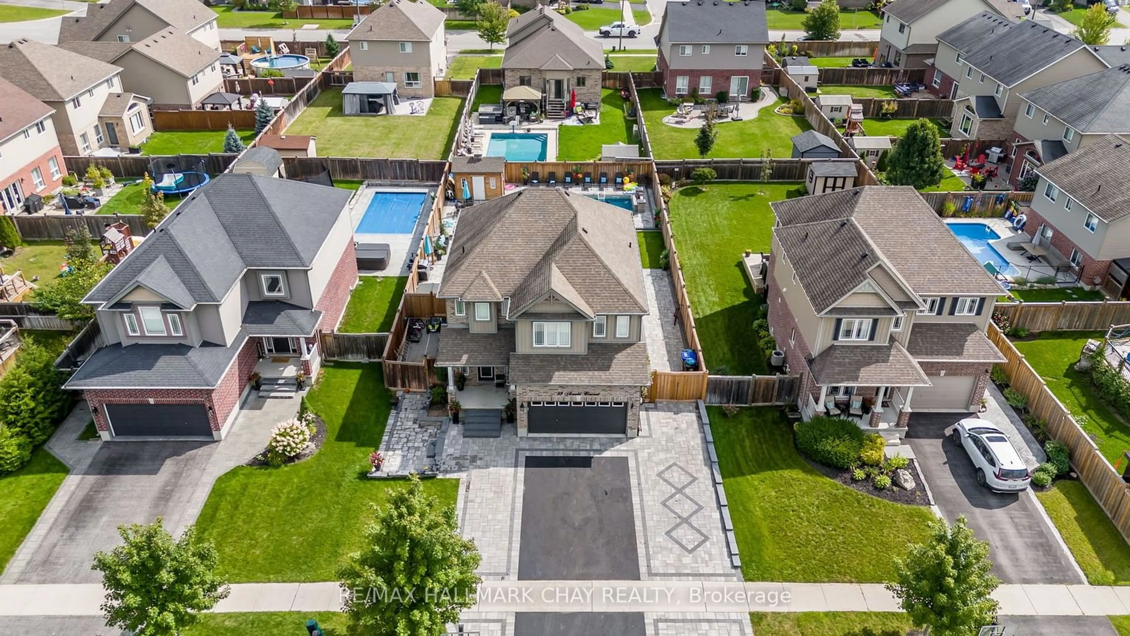 Frontside or backside of a home, the fenced backyard for 59 Arnold Cres, Essa Ontario L0M 1B6