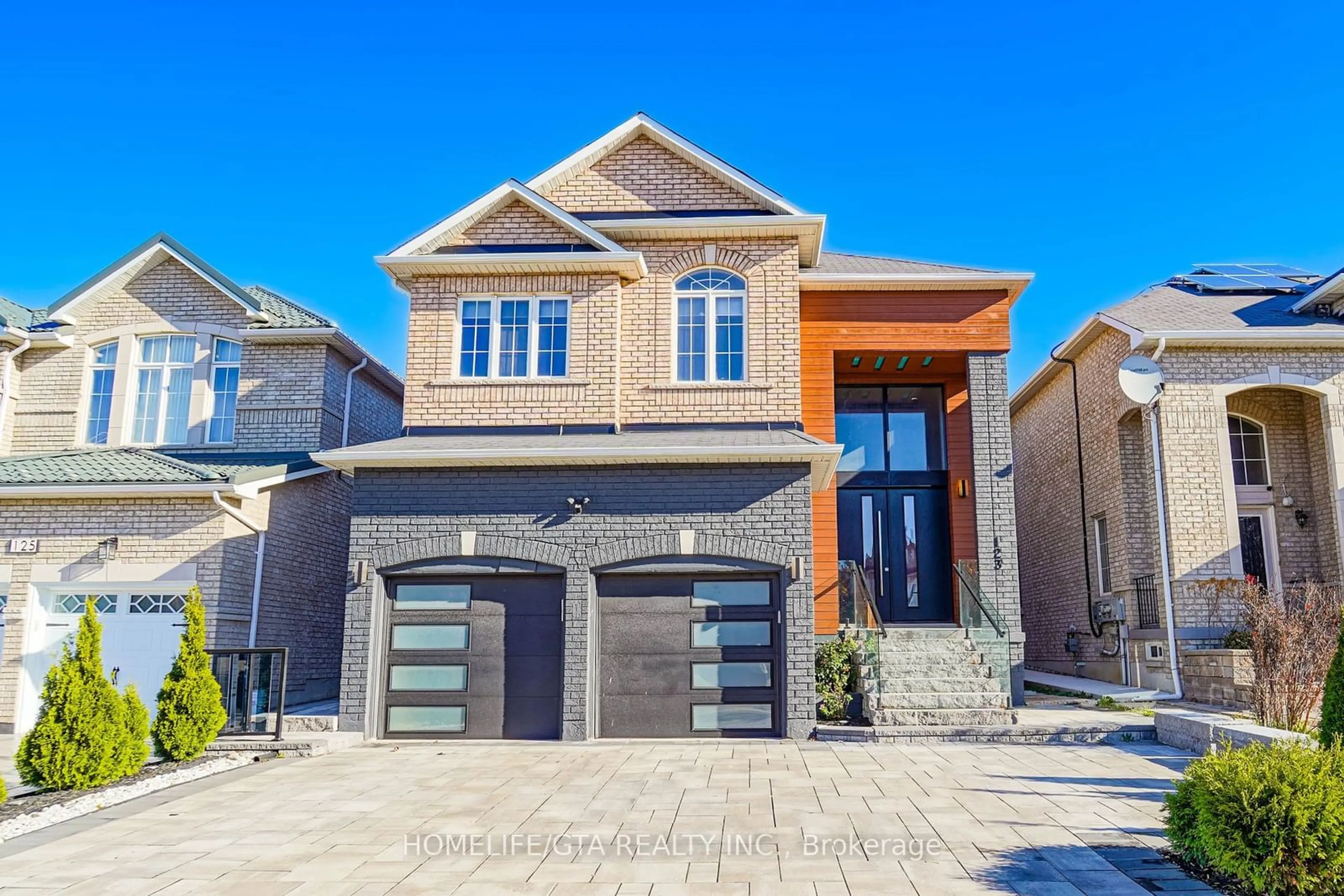 Home with brick exterior material, street for 123 Eastvale Dr, Markham Ontario L3S 0B3