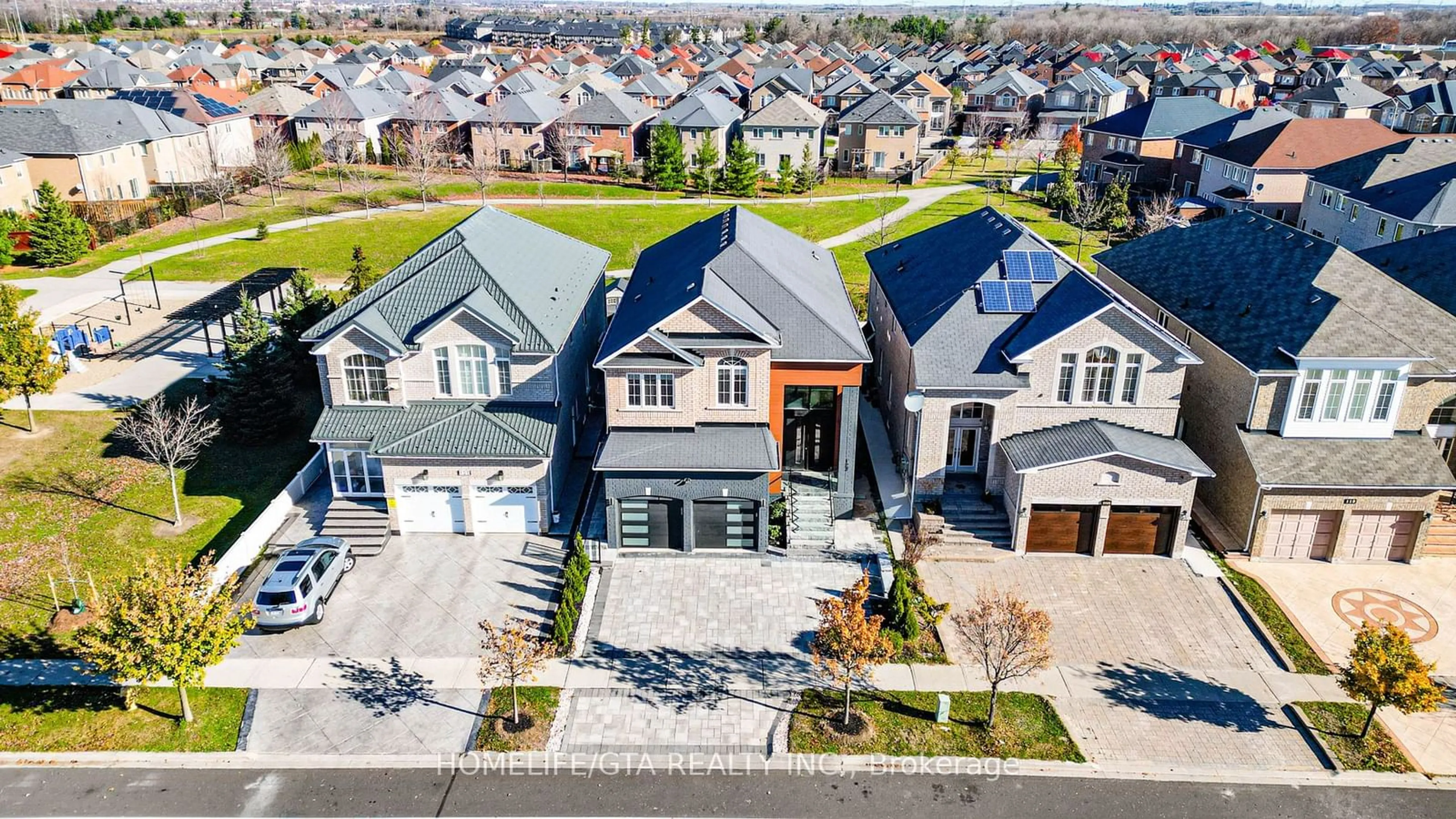 A pic from outside/outdoor area/front of a property/back of a property/a pic from drone, street for 123 Eastvale Dr, Markham Ontario L3S 0B3