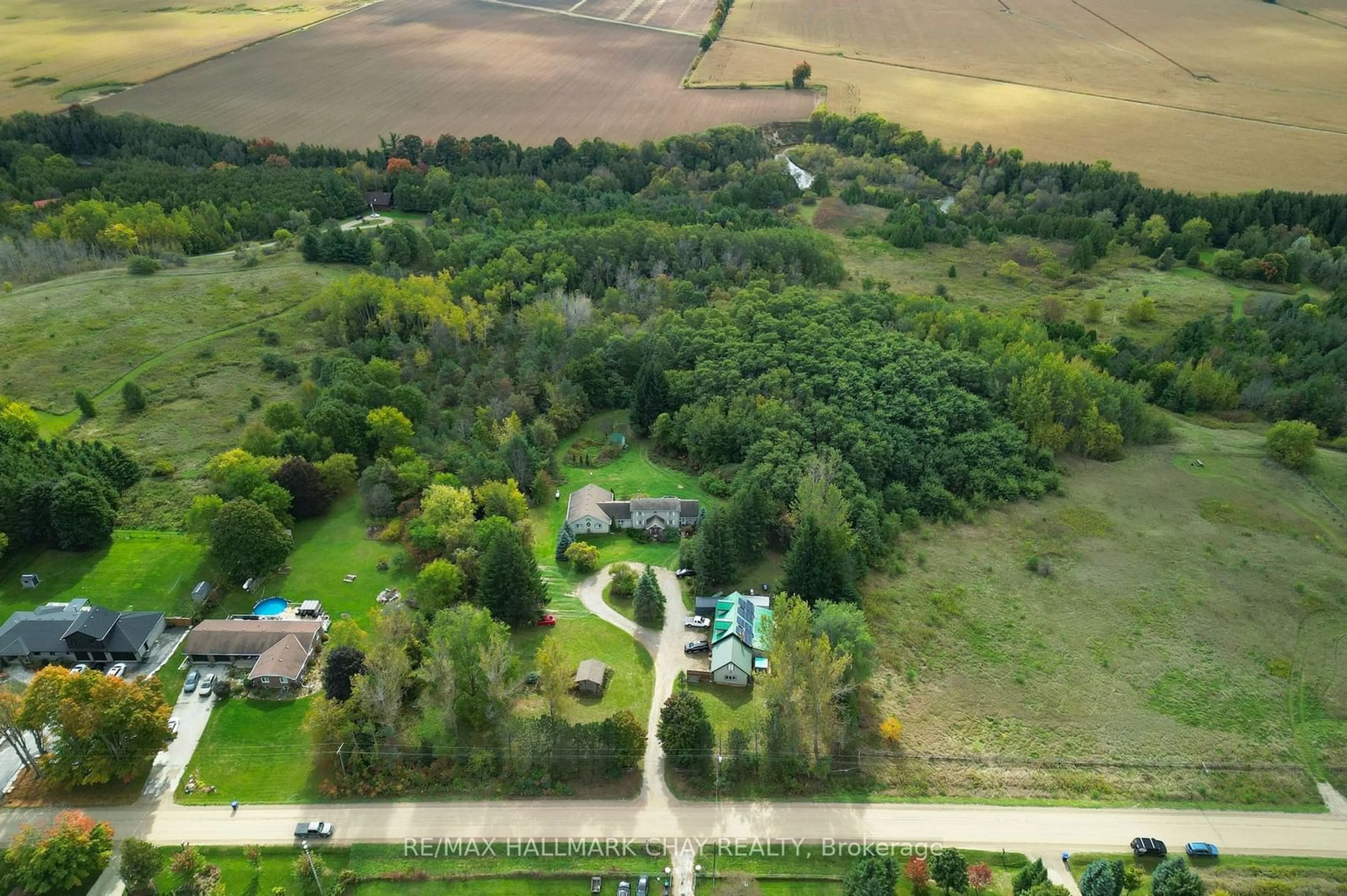 A pic from outside/outdoor area/front of a property/back of a property/a pic from drone, unknown for 6509 13th Line, New Tecumseth Ontario L9R 1V4