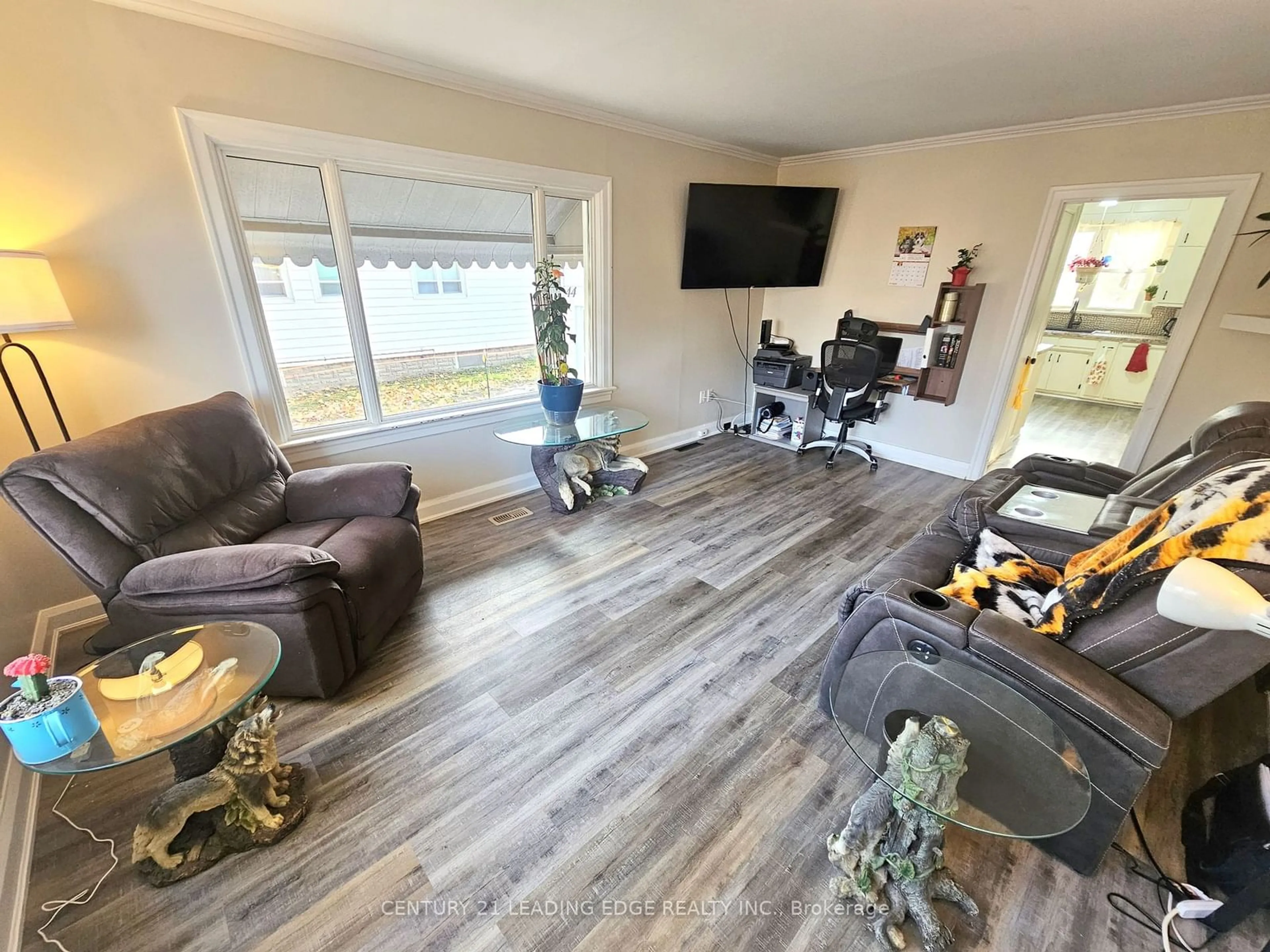 Living room with furniture, wood/laminate floor for 44 Albert St, Brock Ontario L0C 1H0