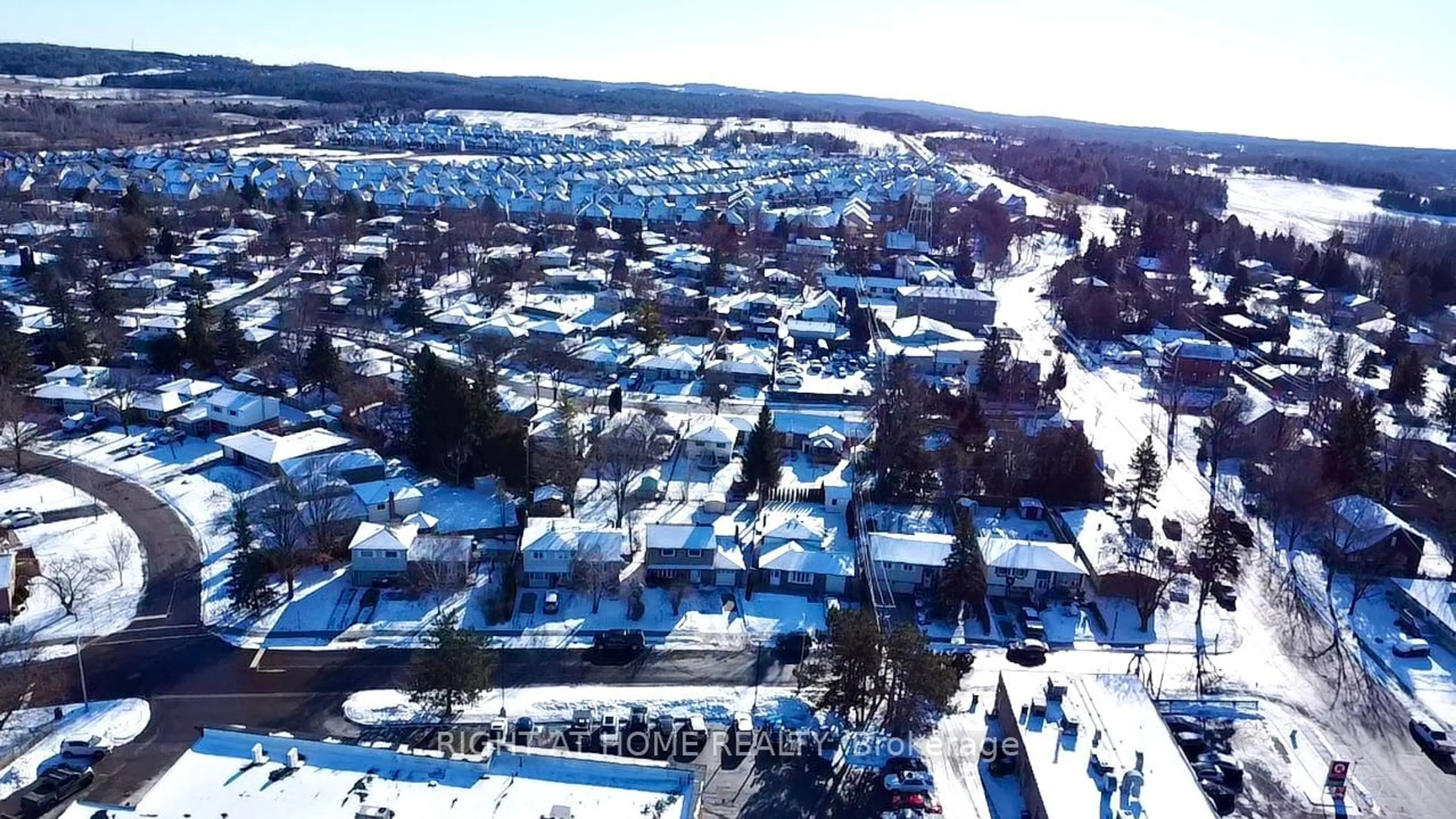 A pic from outside/outdoor area/front of a property/back of a property/a pic from drone, street for 9 Rogers Rd, New Tecumseth Ontario L0G 1W0