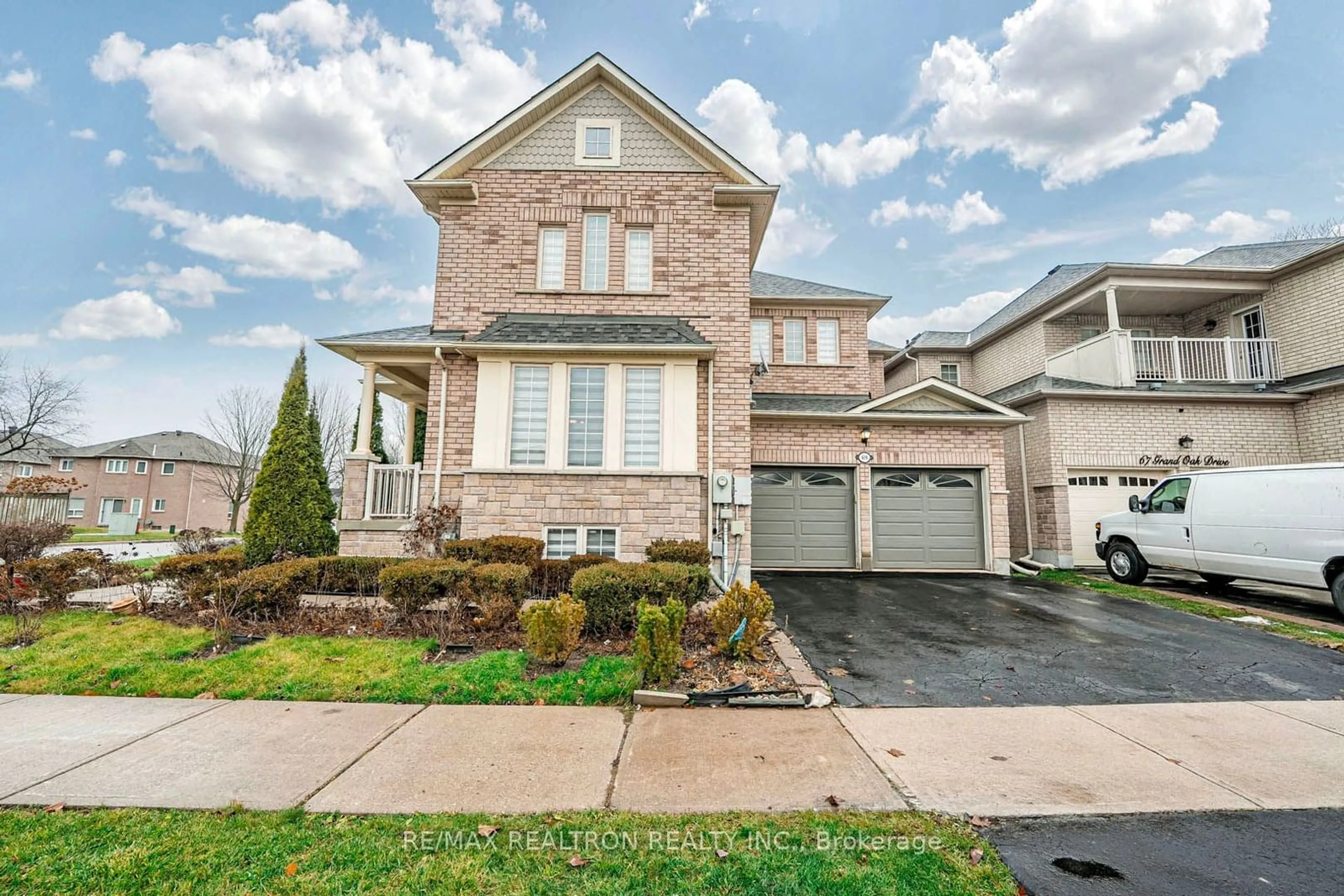 Home with brick exterior material, street for 69 Grand Oak Dr, Richmond Hill Ontario L4E 4A2