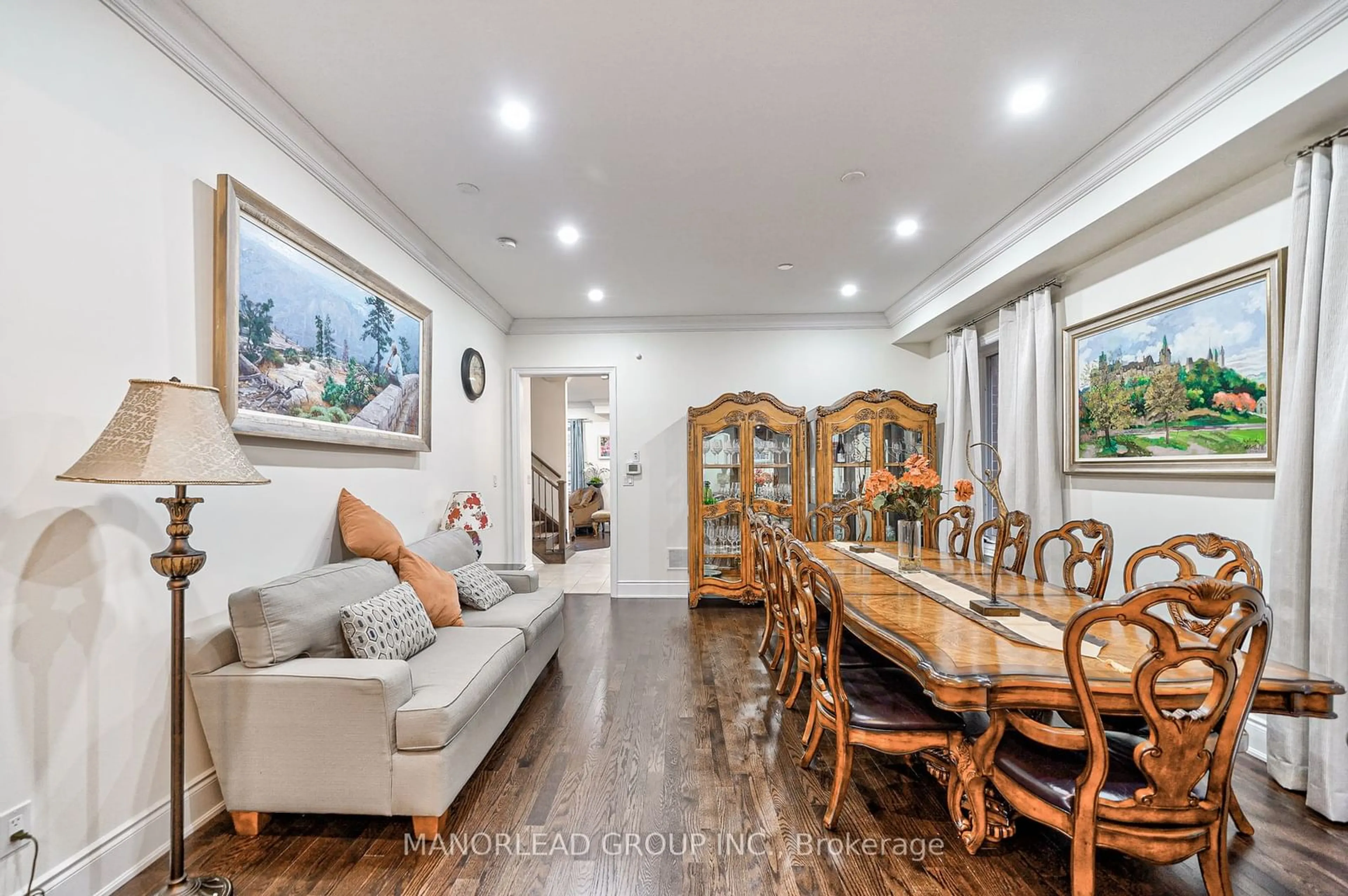 Dining room, wood/laminate floor for 17 Mario Ave, Markham Ontario L6C 0X8