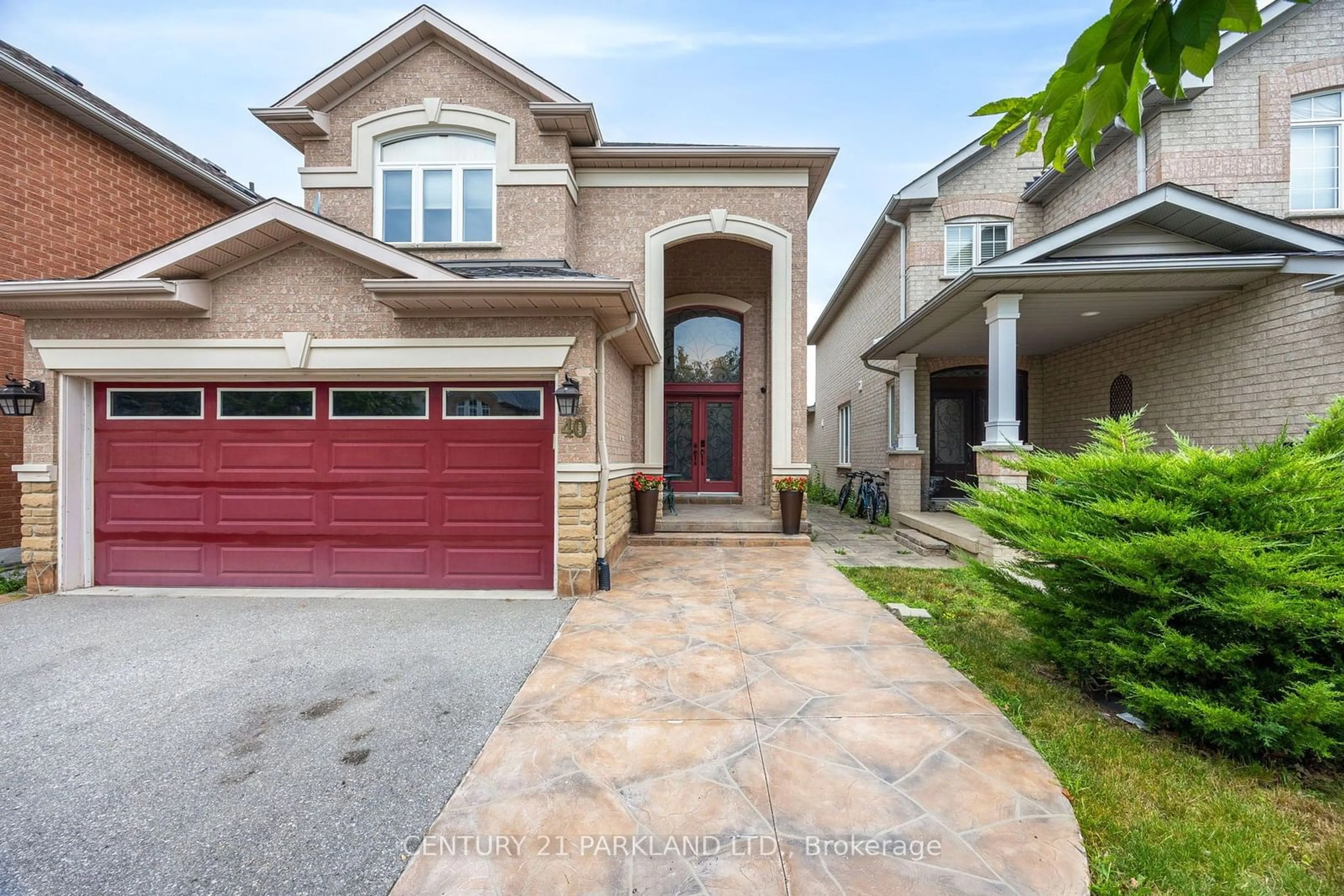 Home with brick exterior material, street for 40 Lady Fern Dr, Markham Ontario L3S 4C2