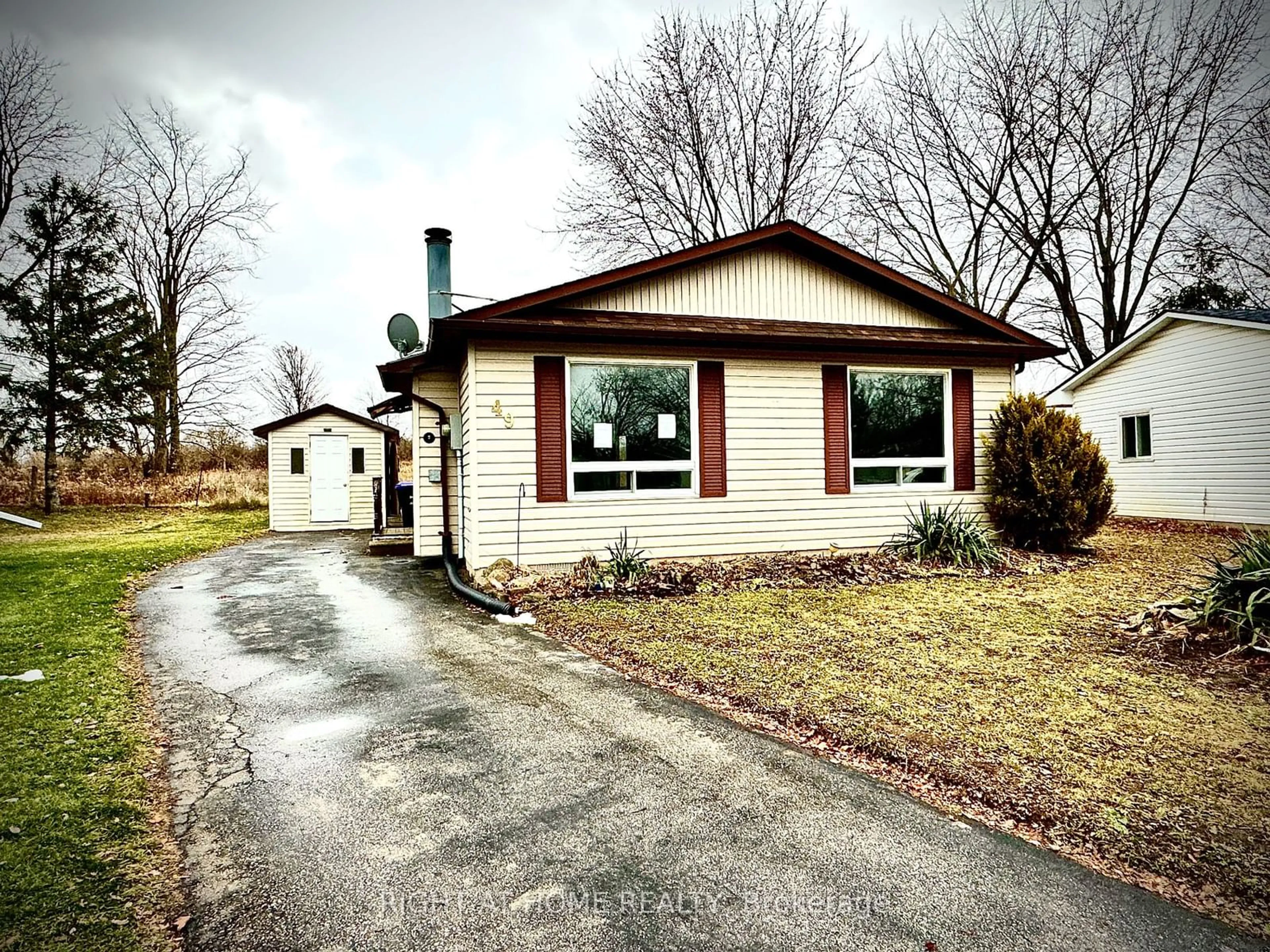 Home with vinyl exterior material, street for 49 ROYAL OAK Dr, Innisfil Ontario L0L 1L0