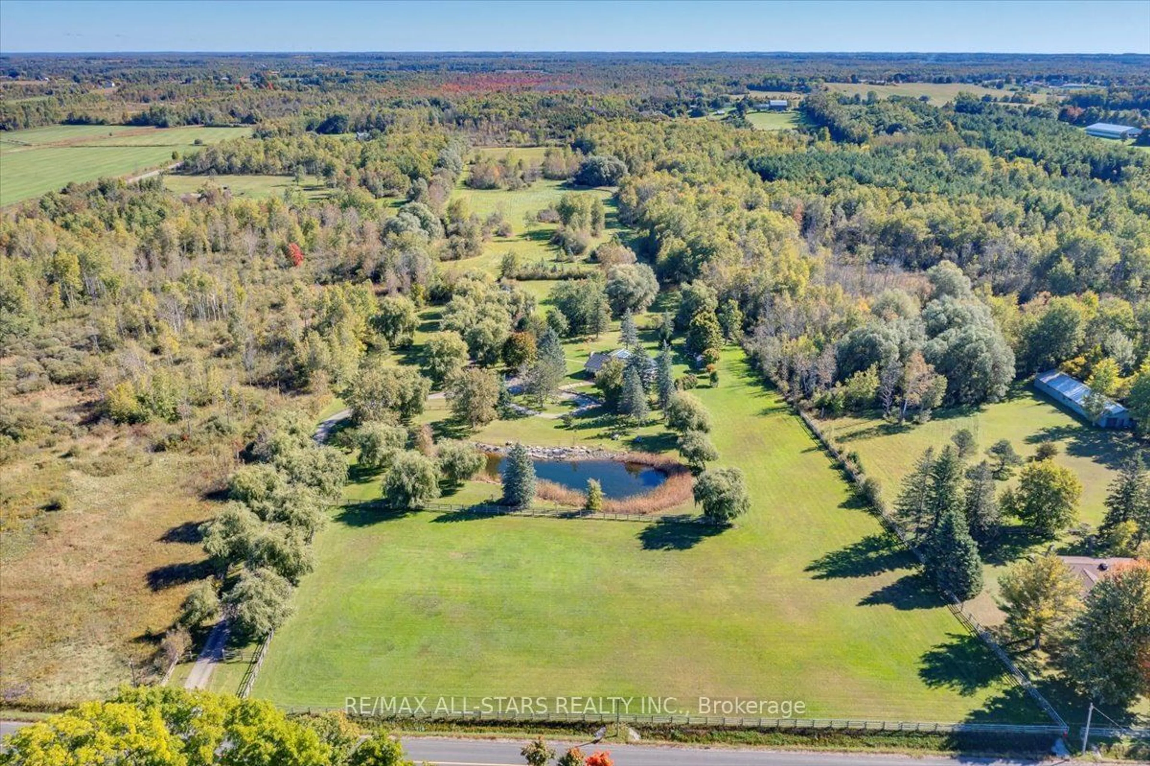 A pic from outside/outdoor area/front of a property/back of a property/a pic from drone, water/lake/river/ocean view for 24185 Kennedy Rd, Georgina Ontario L0E 1R0