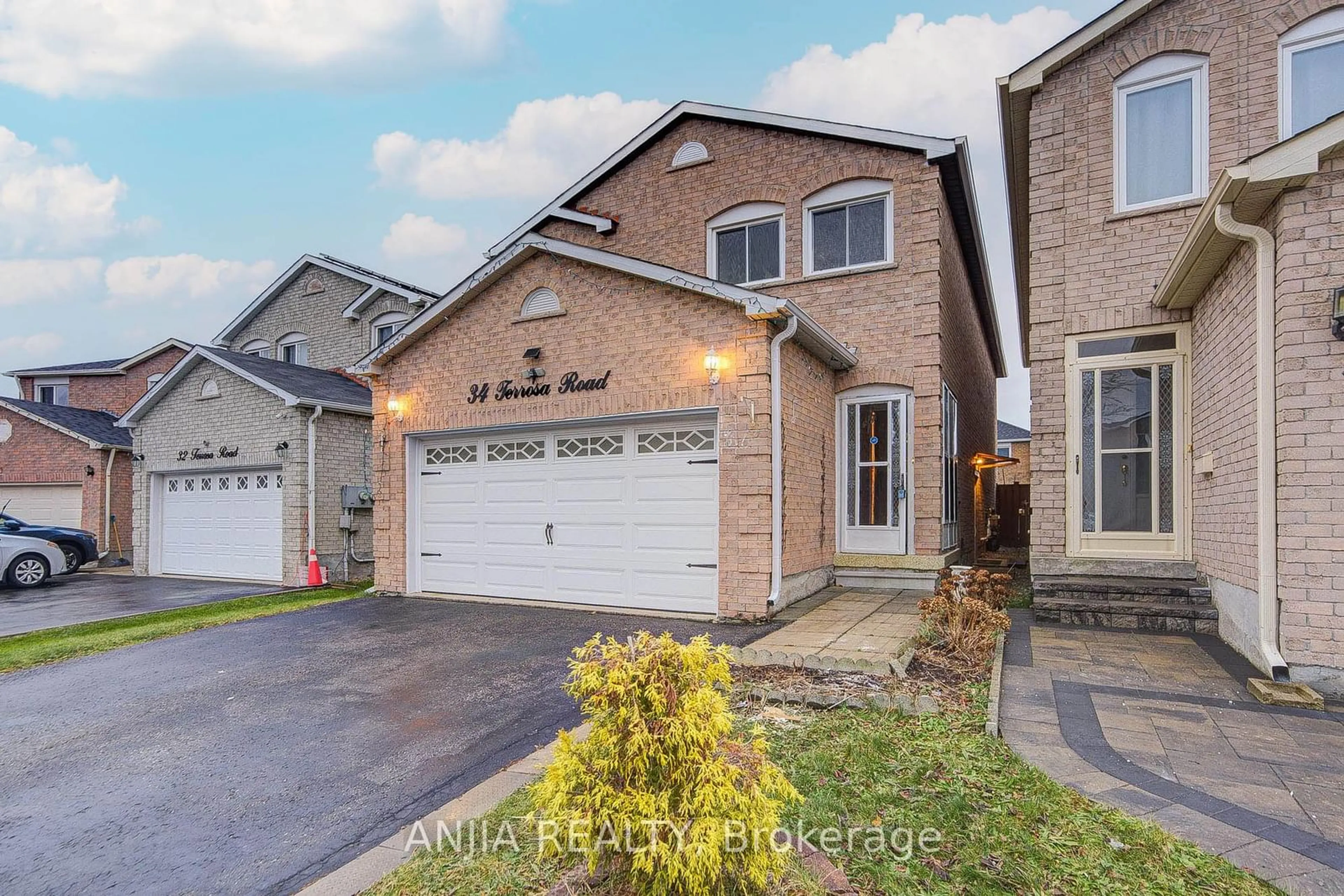 Home with brick exterior material, street for 34 Terrosa Rd, Markham Ontario L3S 2M7