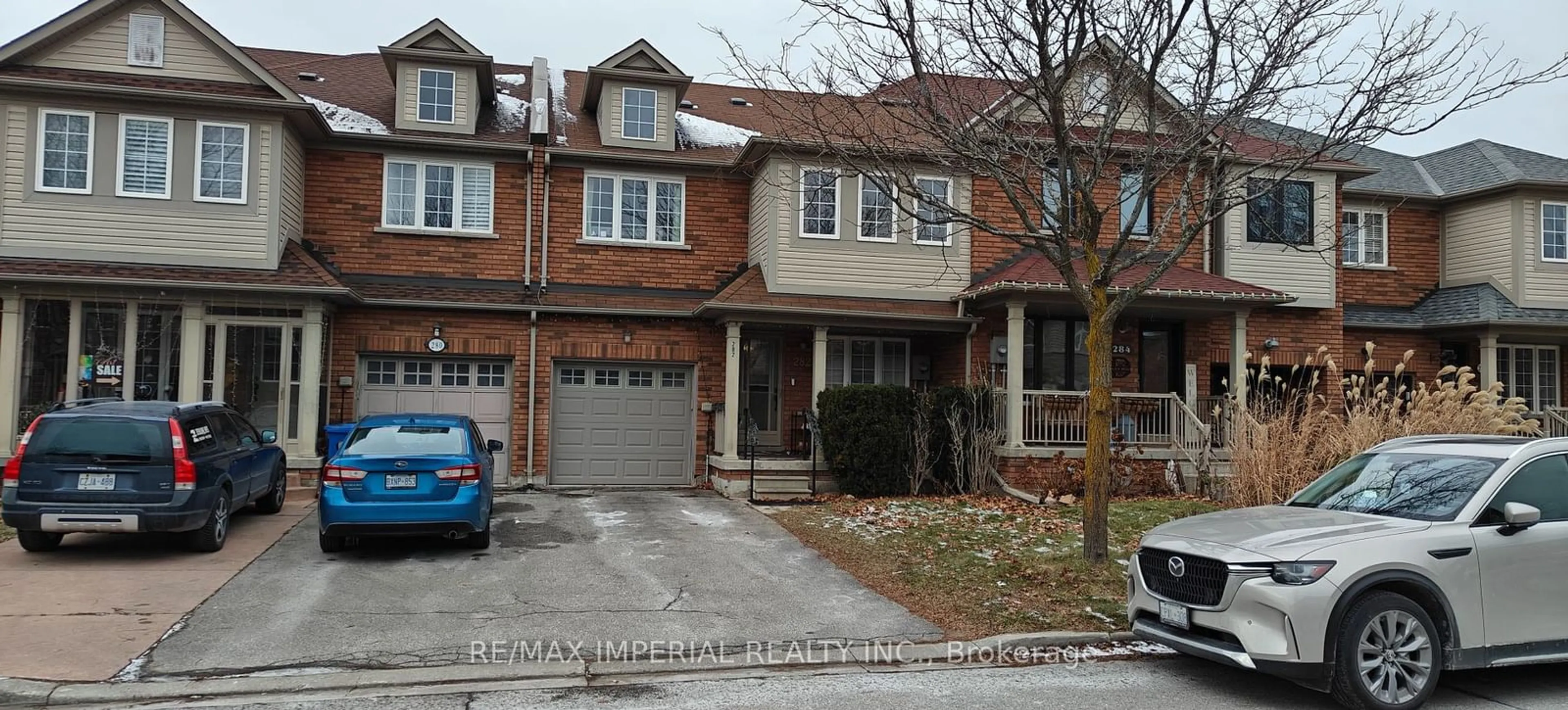 Home with brick exterior material, street for 282 Coachwhip Tr, Newmarket Ontario L3X 2Y4