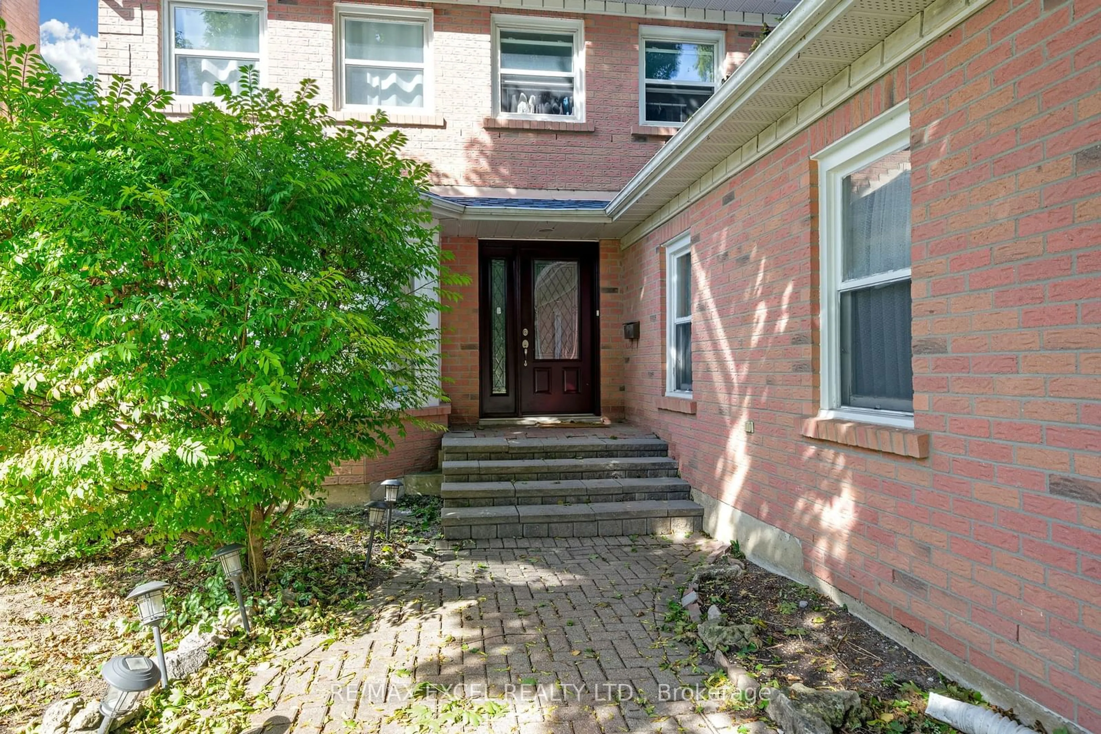 Home with brick exterior material, street for 22 The Bridle Tr, Markham Ontario L3R 4E9