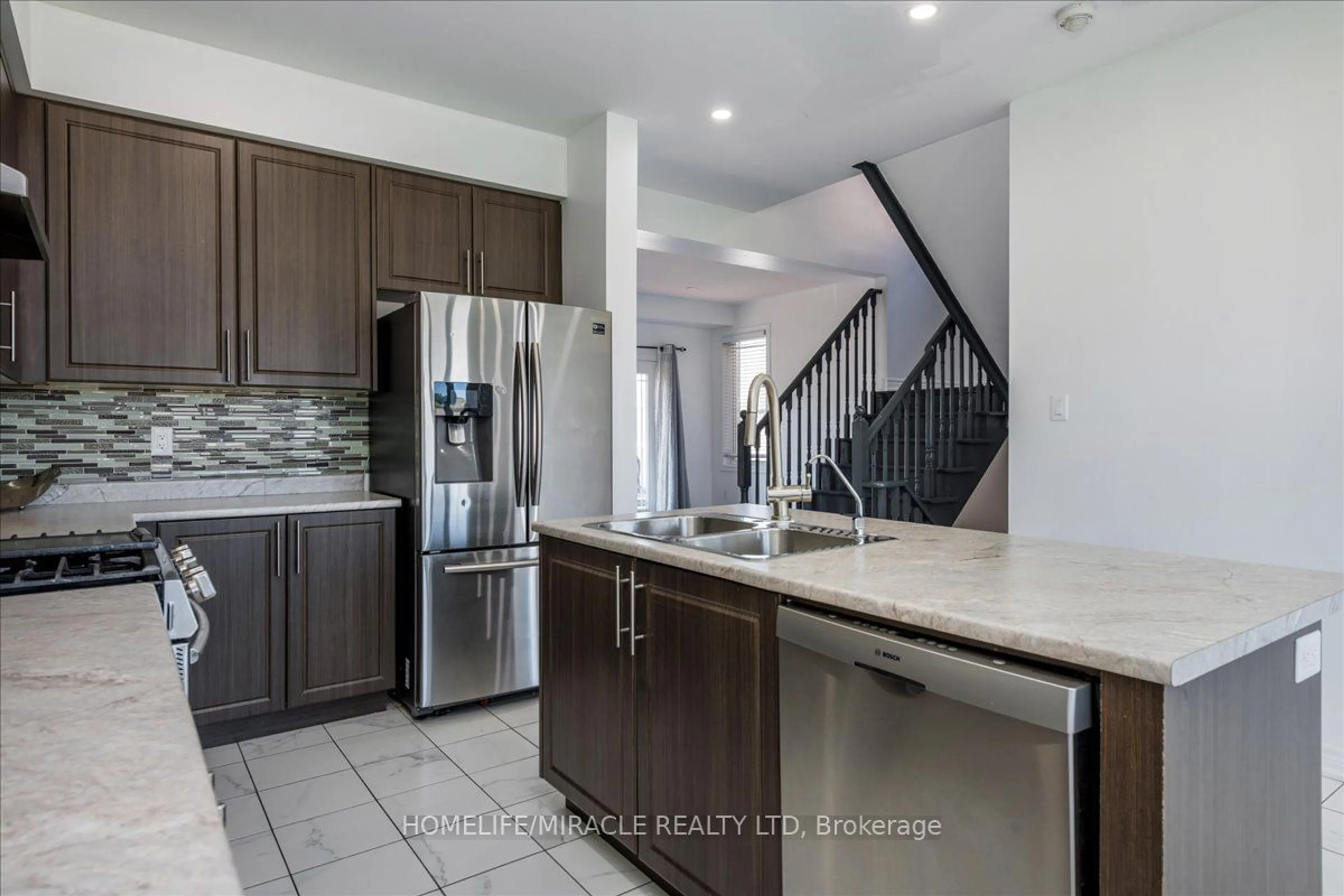 Open concept kitchen, ceramic/tile floor for 12 Janes Cres, New Tecumseth Ontario L9R 0T2