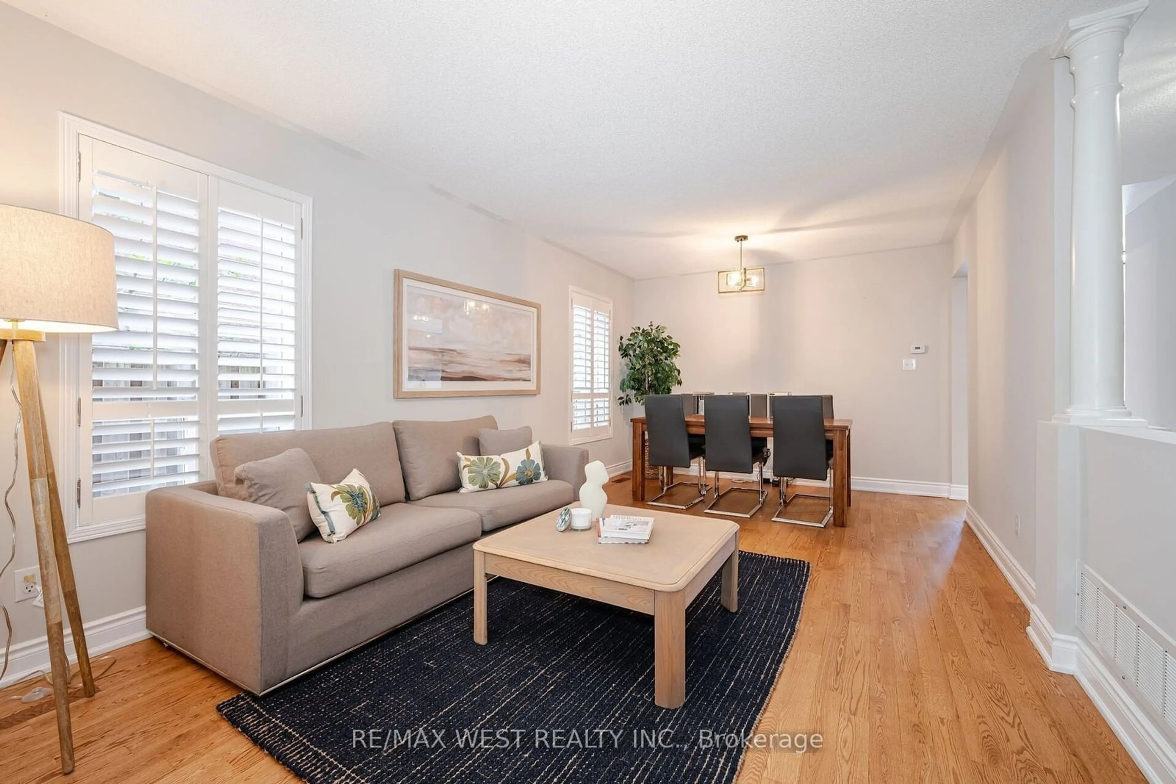 Living room with furniture, wood/laminate floor for 328 St. Joan Arc Ave, Vaughan Ontario L6A 3N1