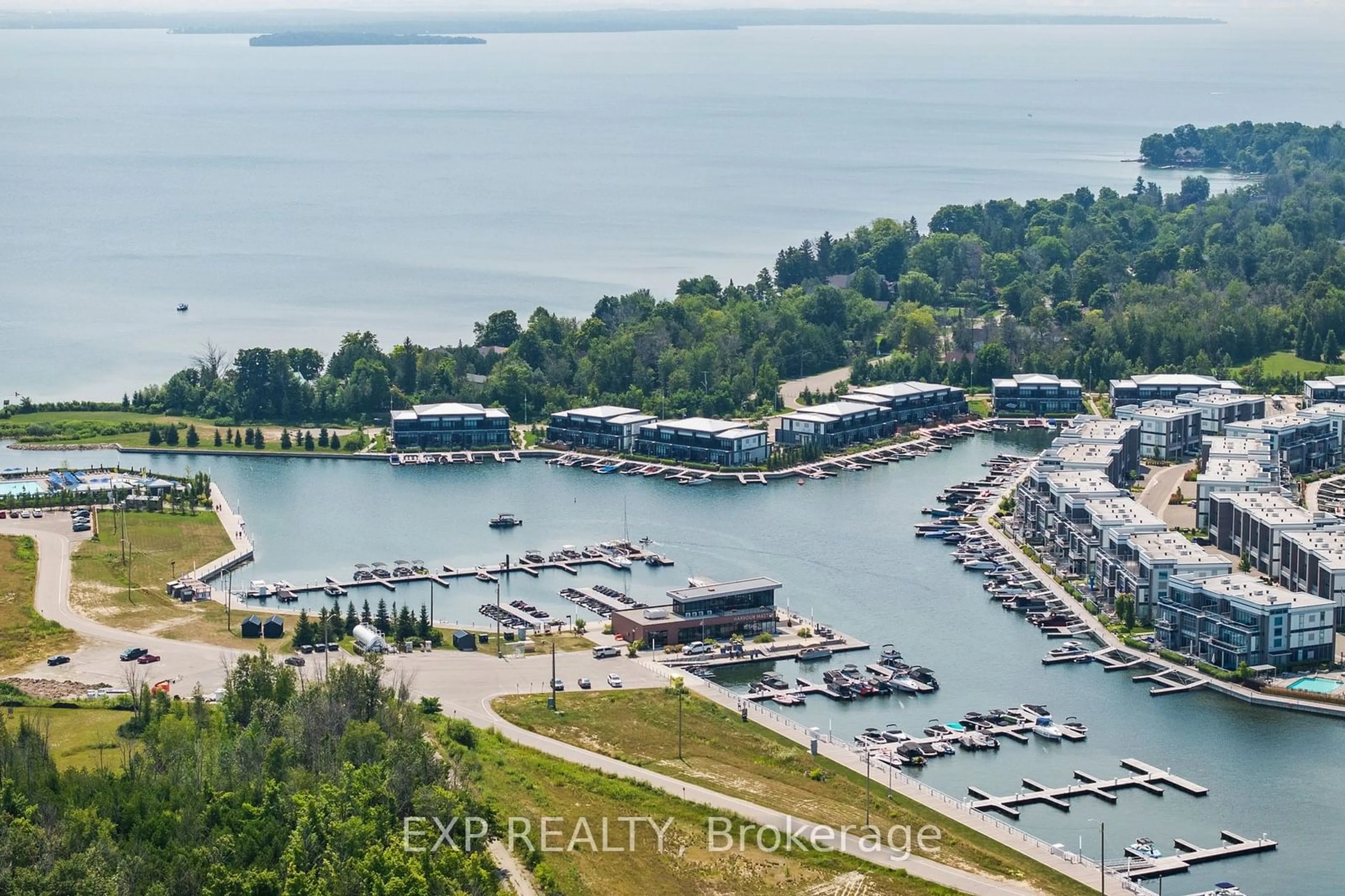 A pic from outside/outdoor area/front of a property/back of a property/a pic from drone, water/lake/river/ocean view for 271 Sea Ray Ave #B107, Innisfil Ontario L9S 0J4