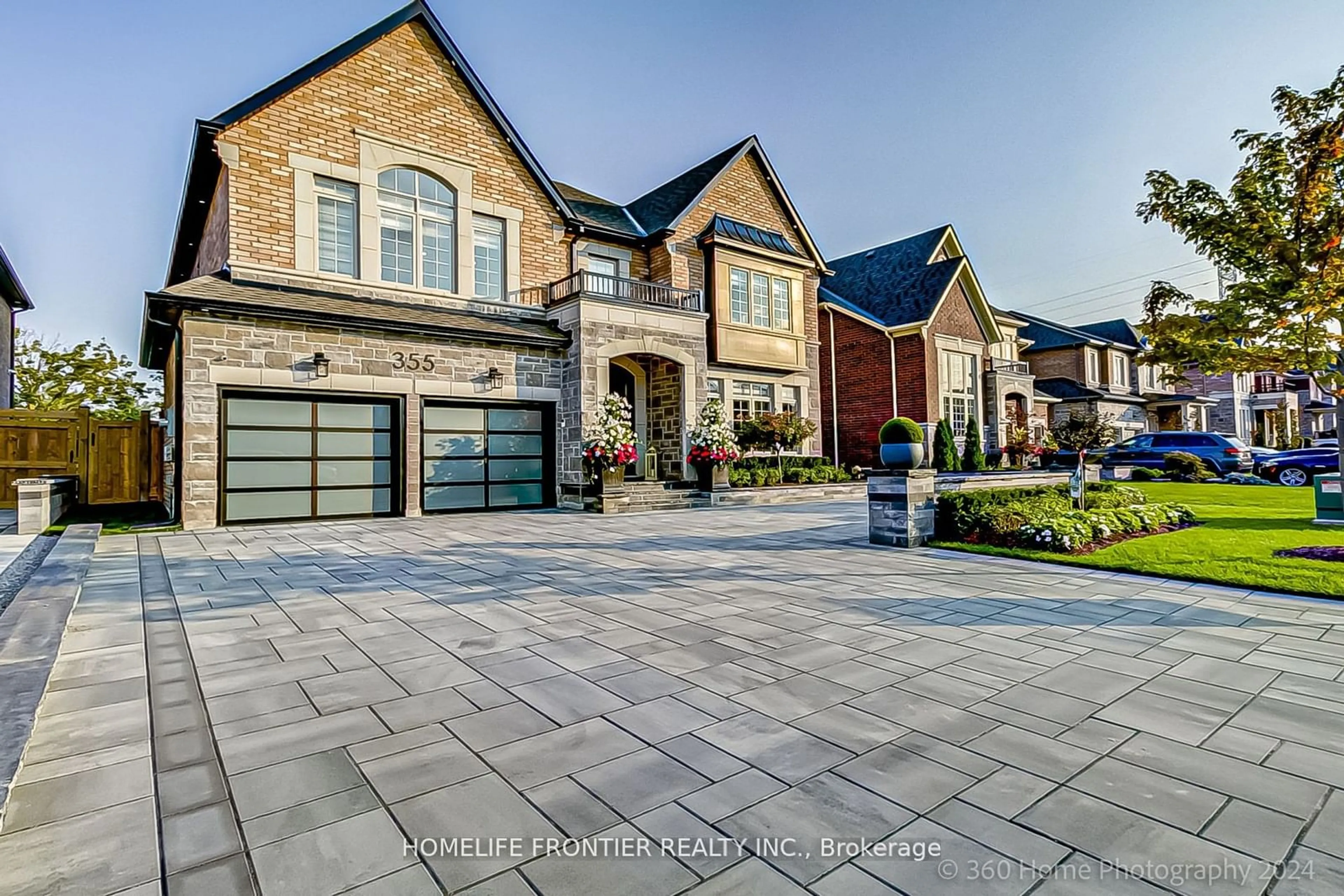 Home with brick exterior material, street for 355 Reg Harrison Tr, Newmarket Ontario L3X 0M2