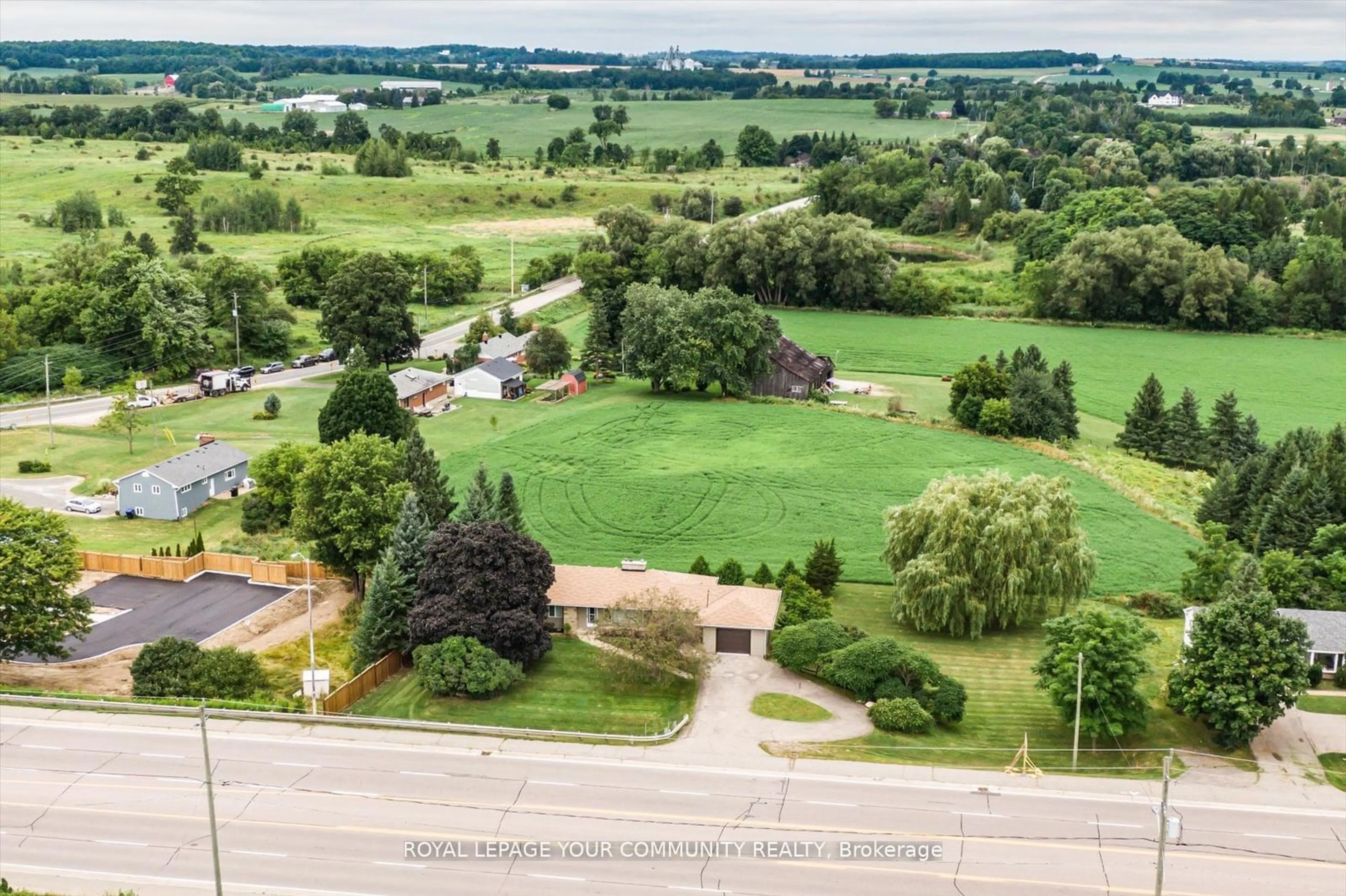 A pic from outside/outdoor area/front of a property/back of a property/a pic from drone, mountain view for 6162 Highway 9, King Ontario L0G 1T0