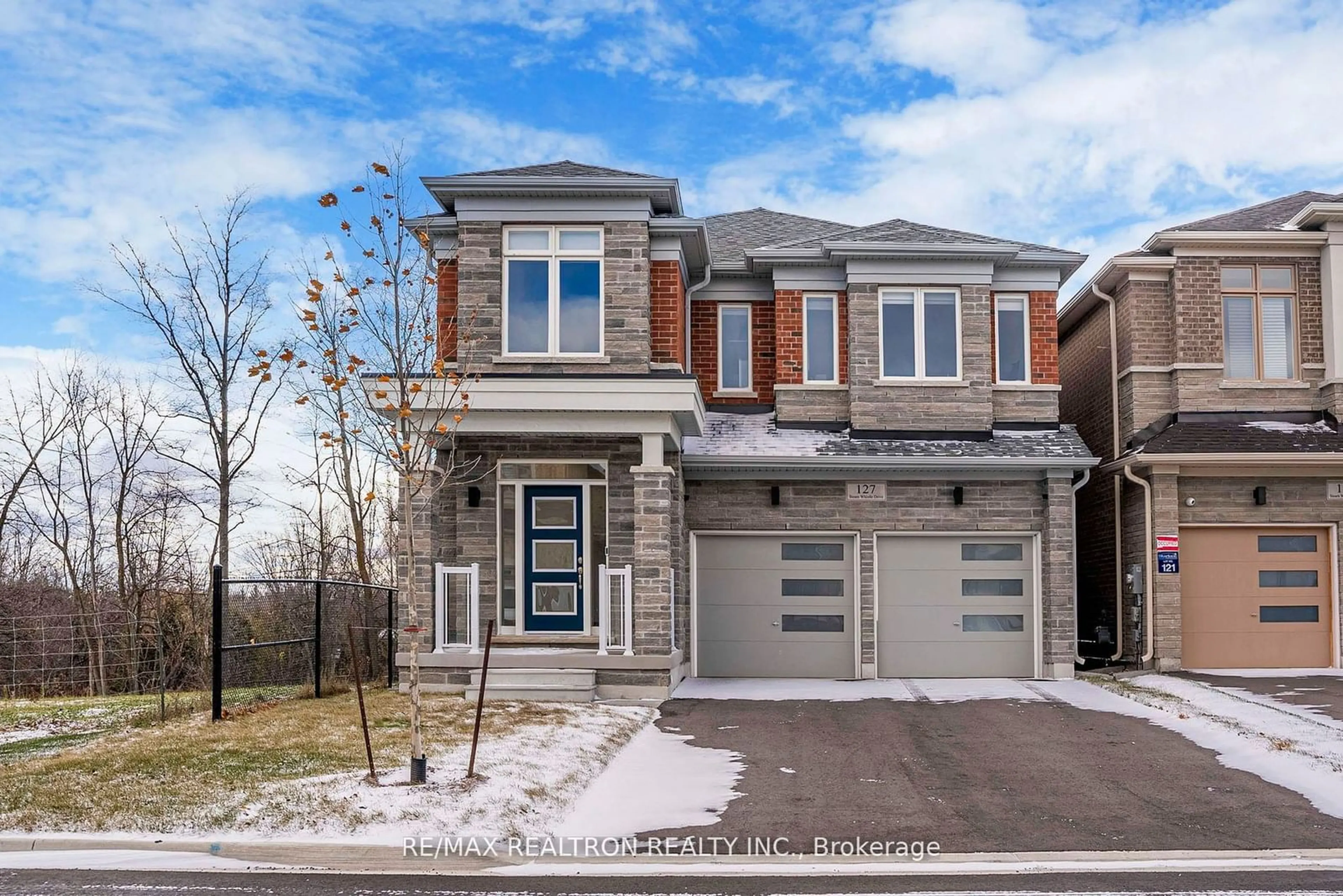 Home with brick exterior material, street for 127 Steam Whistle Dr, Whitchurch-Stouffville Ontario L4A 4X5