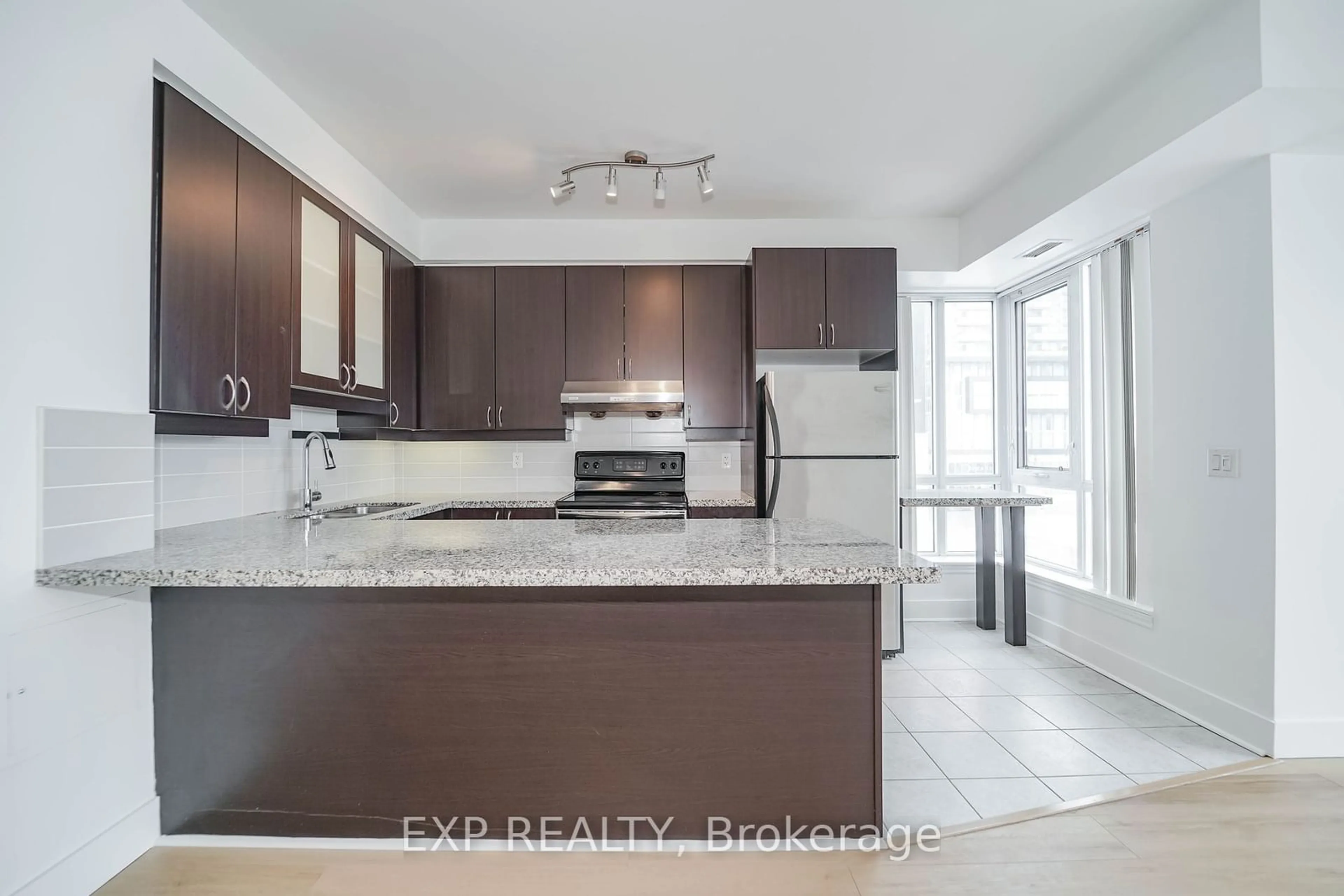 Open concept kitchen, ceramic/tile floor for 57 Upper Duke Cres #307, Markham Ontario L6G 0B9