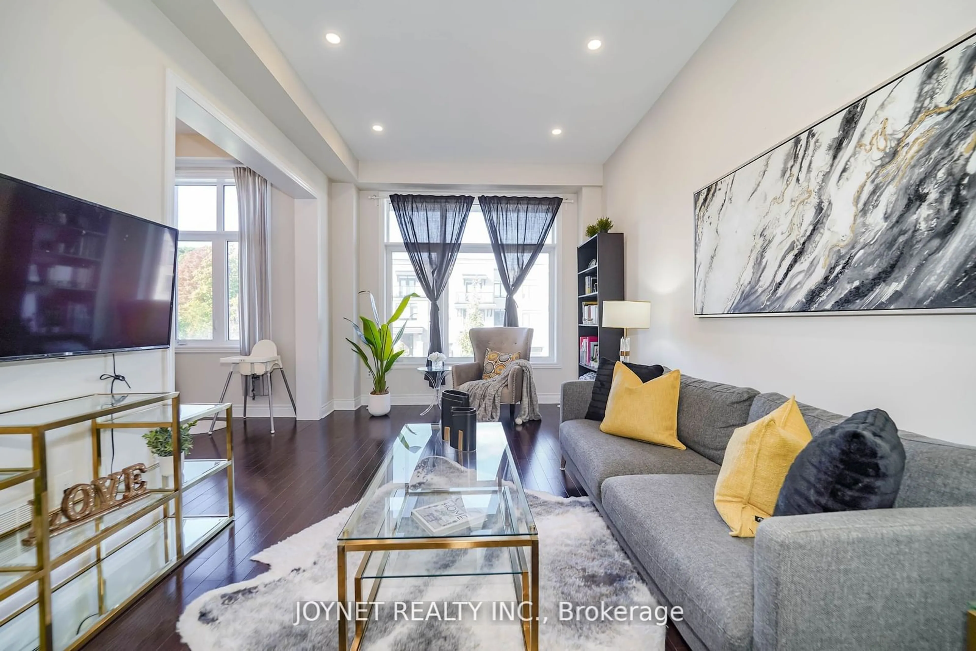 Living room with furniture, wood/laminate floor for 607 Marc Santi Blvd, Vaughan Ontario L6A 4Z8