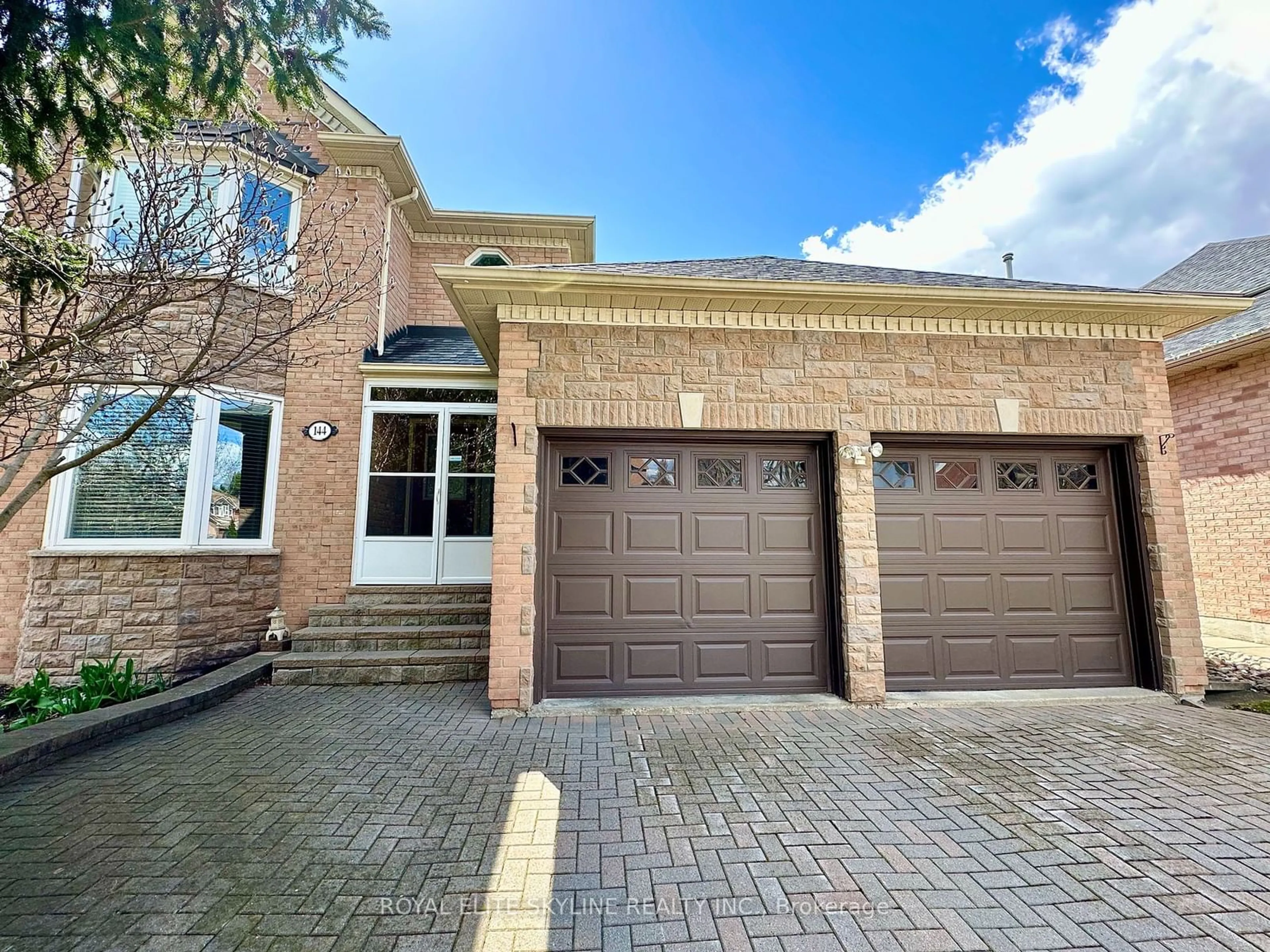 Home with brick exterior material, street for 144 Manhattan Dr, Markham Ontario L3P 7S1