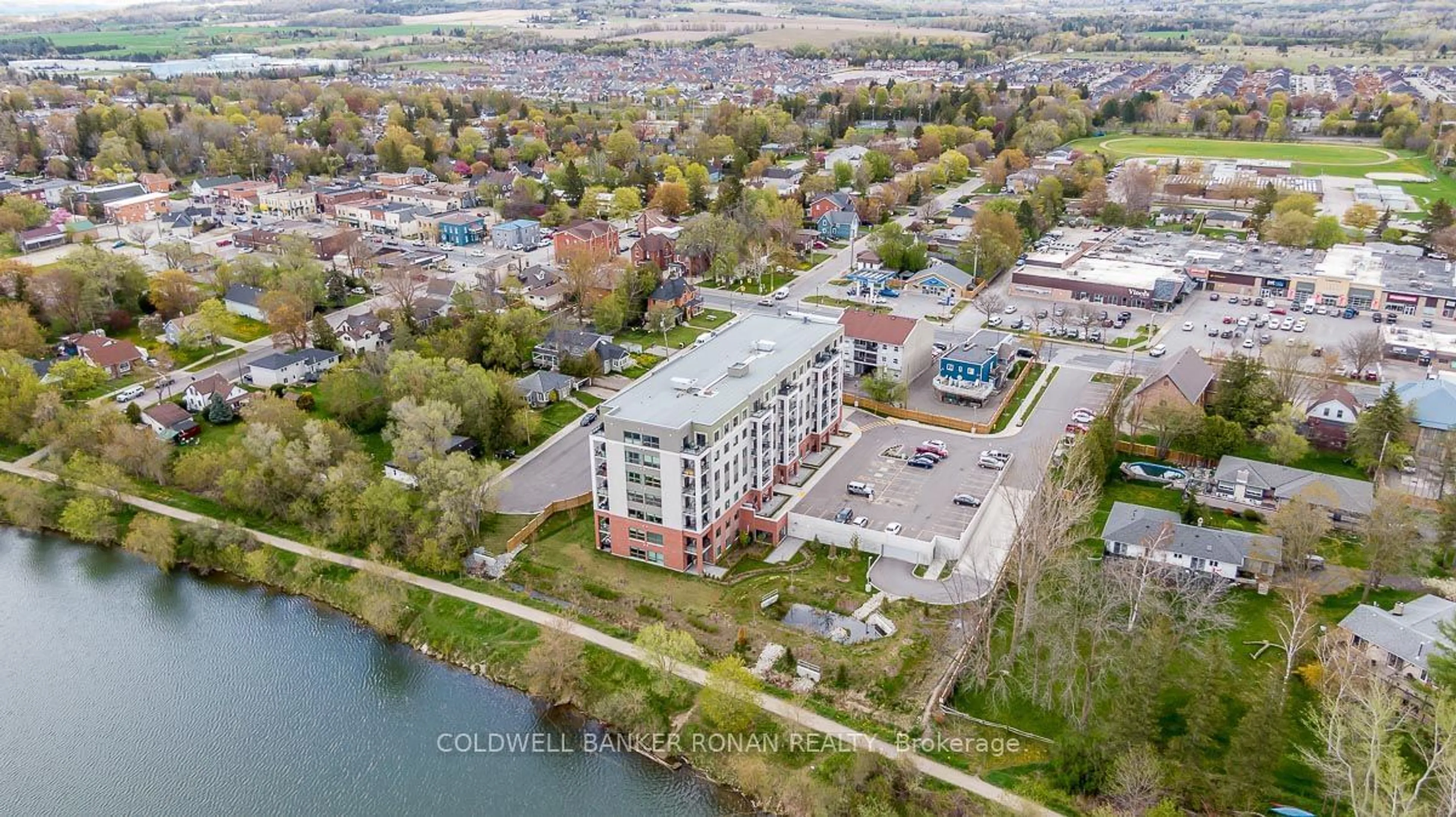 A pic from outside/outdoor area/front of a property/back of a property/a pic from drone, water/lake/river/ocean view for 64 Queen St #609, New Tecumseth Ontario L0G 1W0