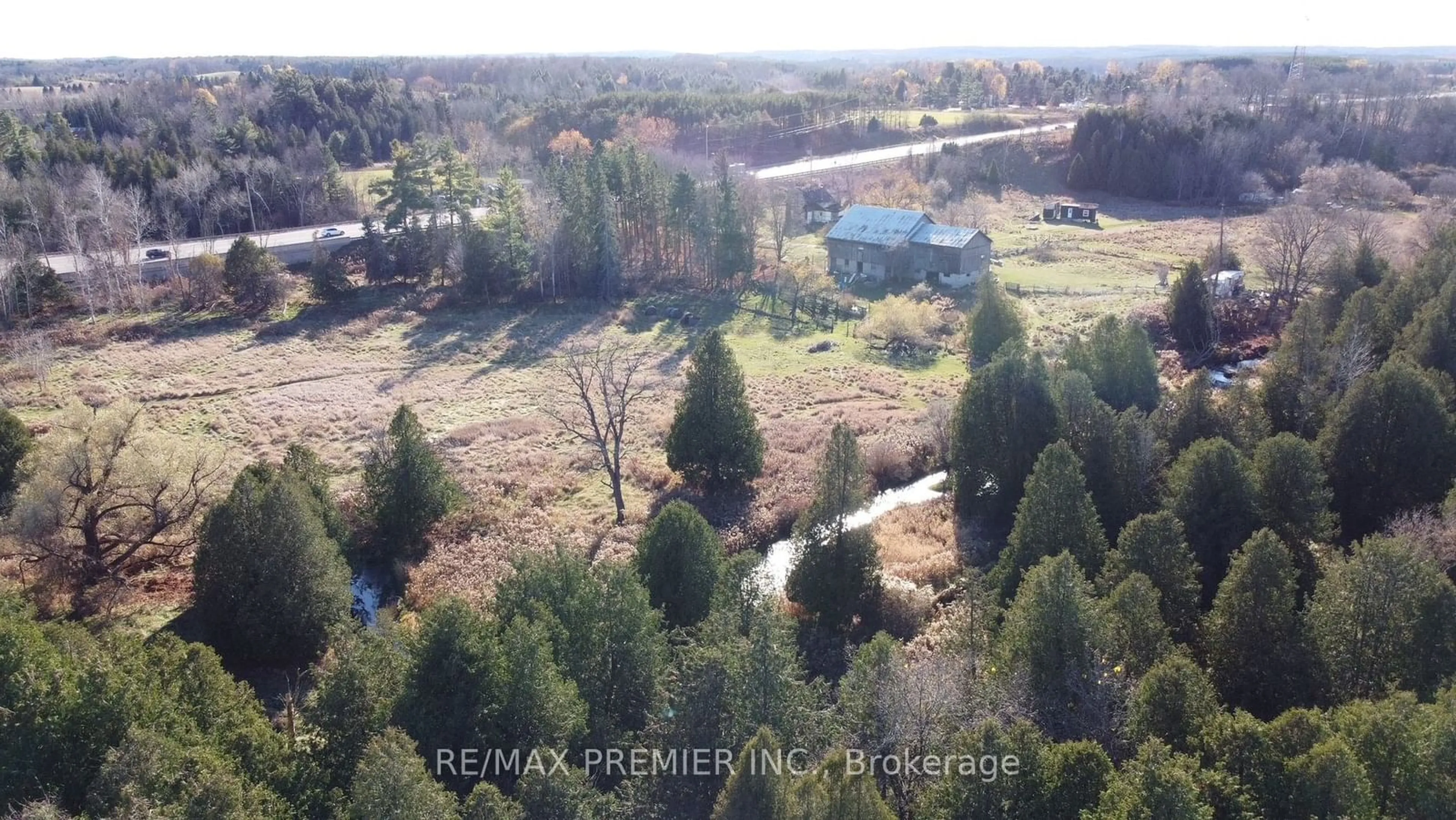 A pic from outside/outdoor area/front of a property/back of a property/a pic from drone, forest/trees view for 9792 Highway 9, Adjala-Tosorontio Ontario L7E 0G3