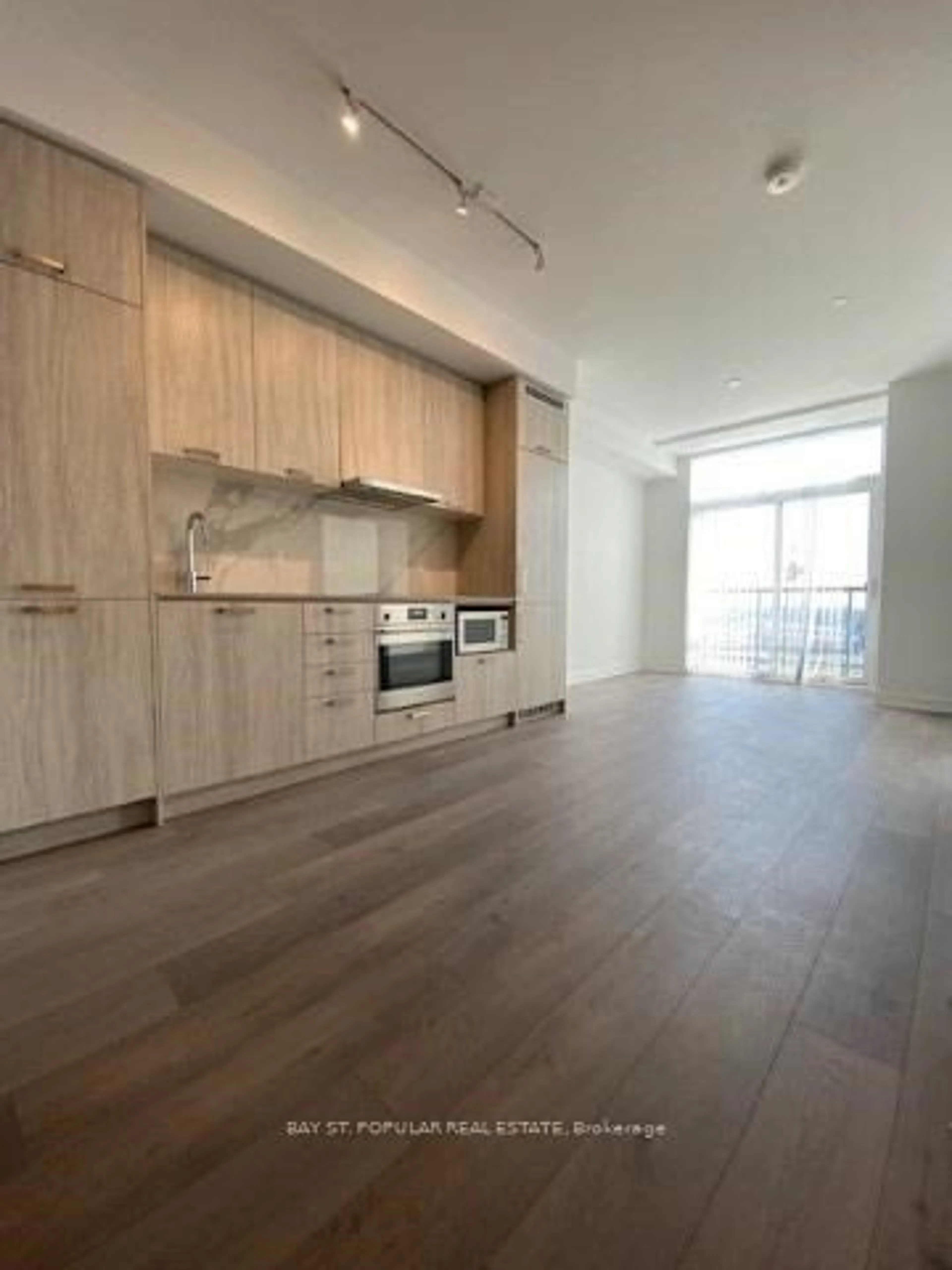 Open concept kitchen, wood/laminate floor for 10 Honeycrisp Cres #1108, Vaughan Ontario L4K 0M7