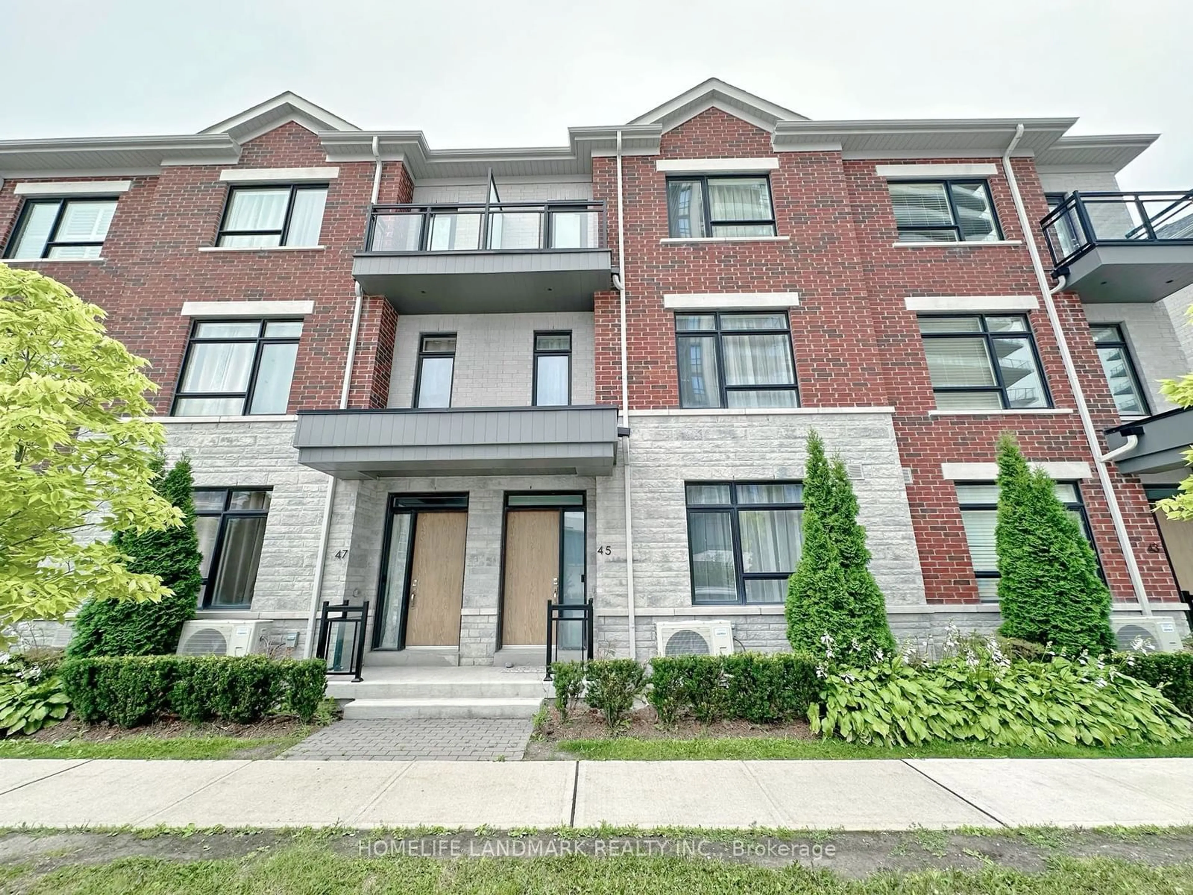 Home with brick exterior material, street for 45 Gandhi Lane, Markham Ontario L3T 0G4