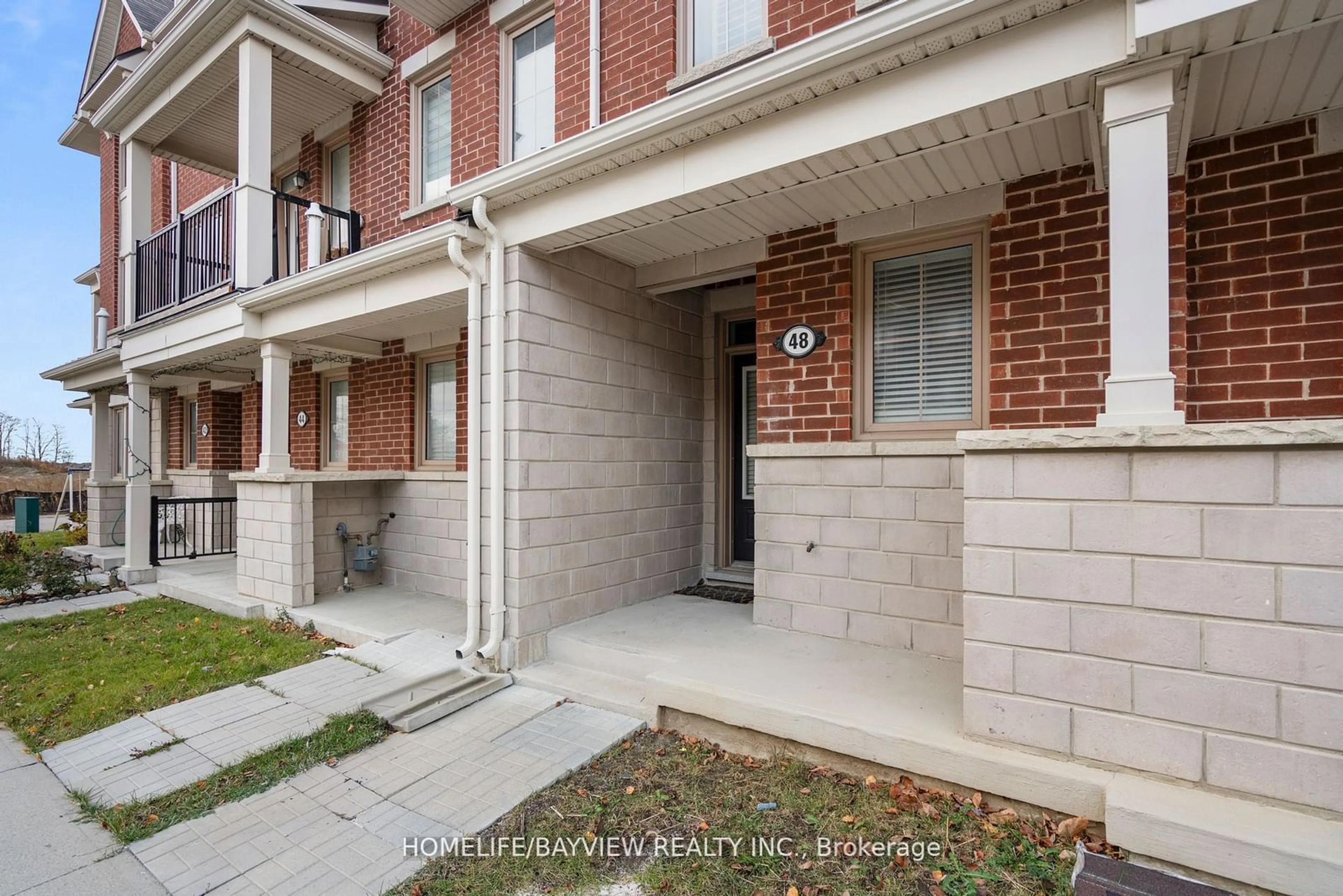 Home with brick exterior material, street for 48 Cornell Centre Blvd, Markham Ontario L6B 1N1