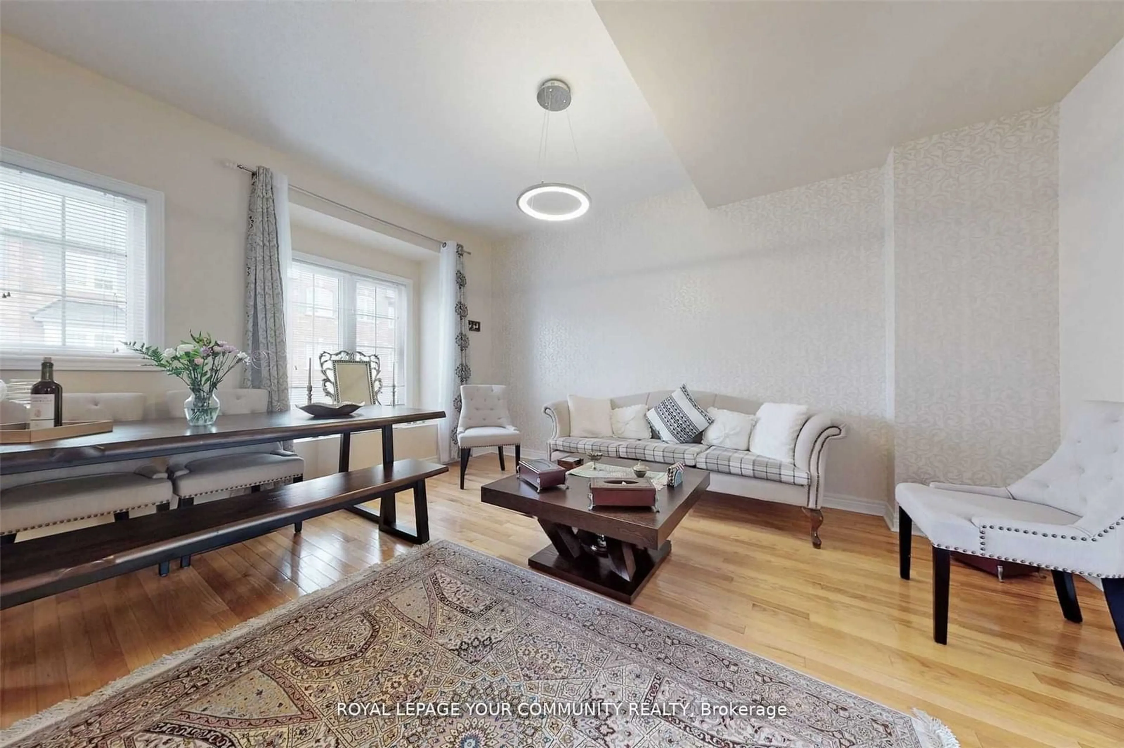 Living room with furniture, wood/laminate floor for 15 Old Colony Rd #57, Richmond Hill Ontario L4E 4L5