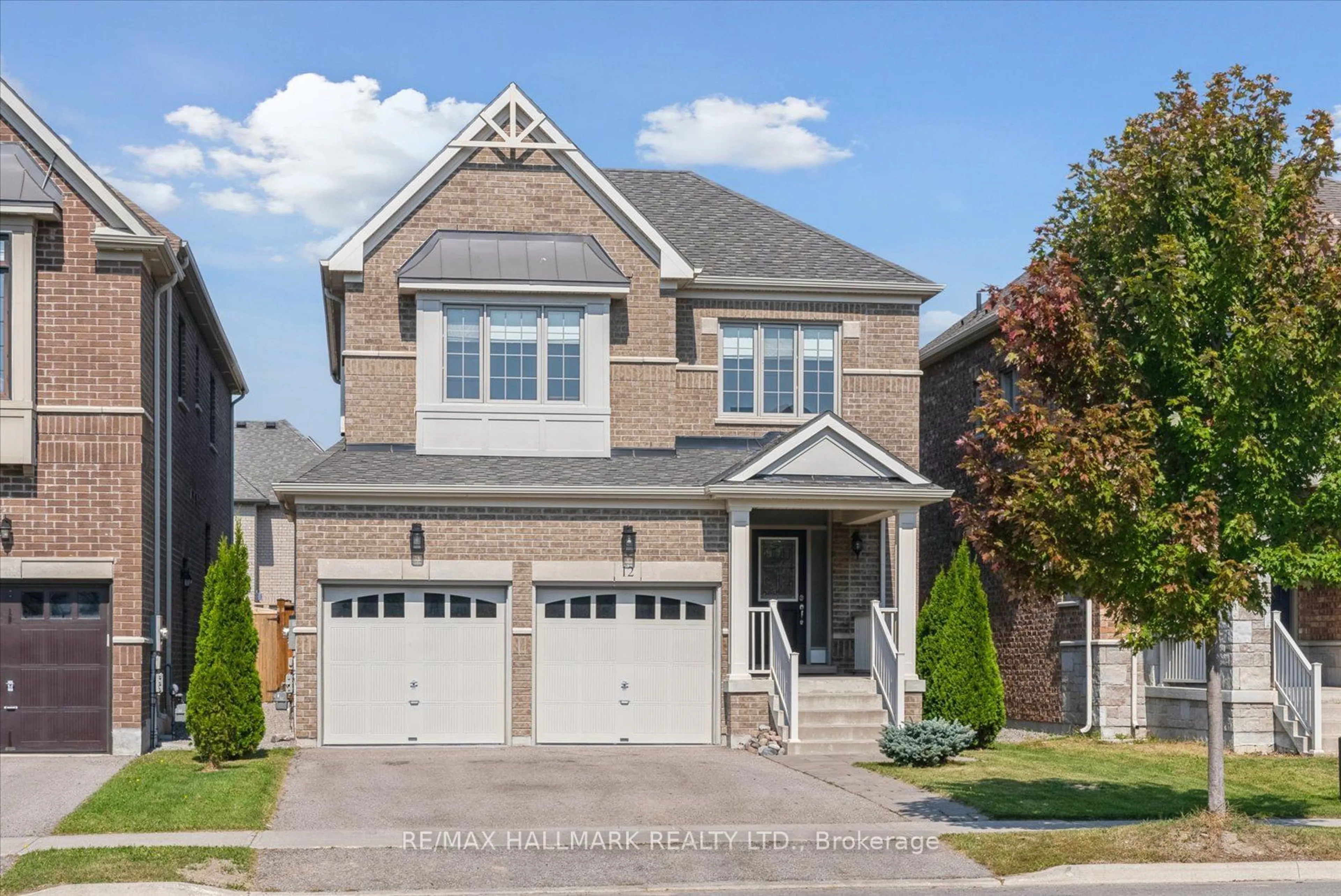 Home with brick exterior material, street for 12 Deer Pass Rd, East Gwillimbury Ontario L9N 0S5