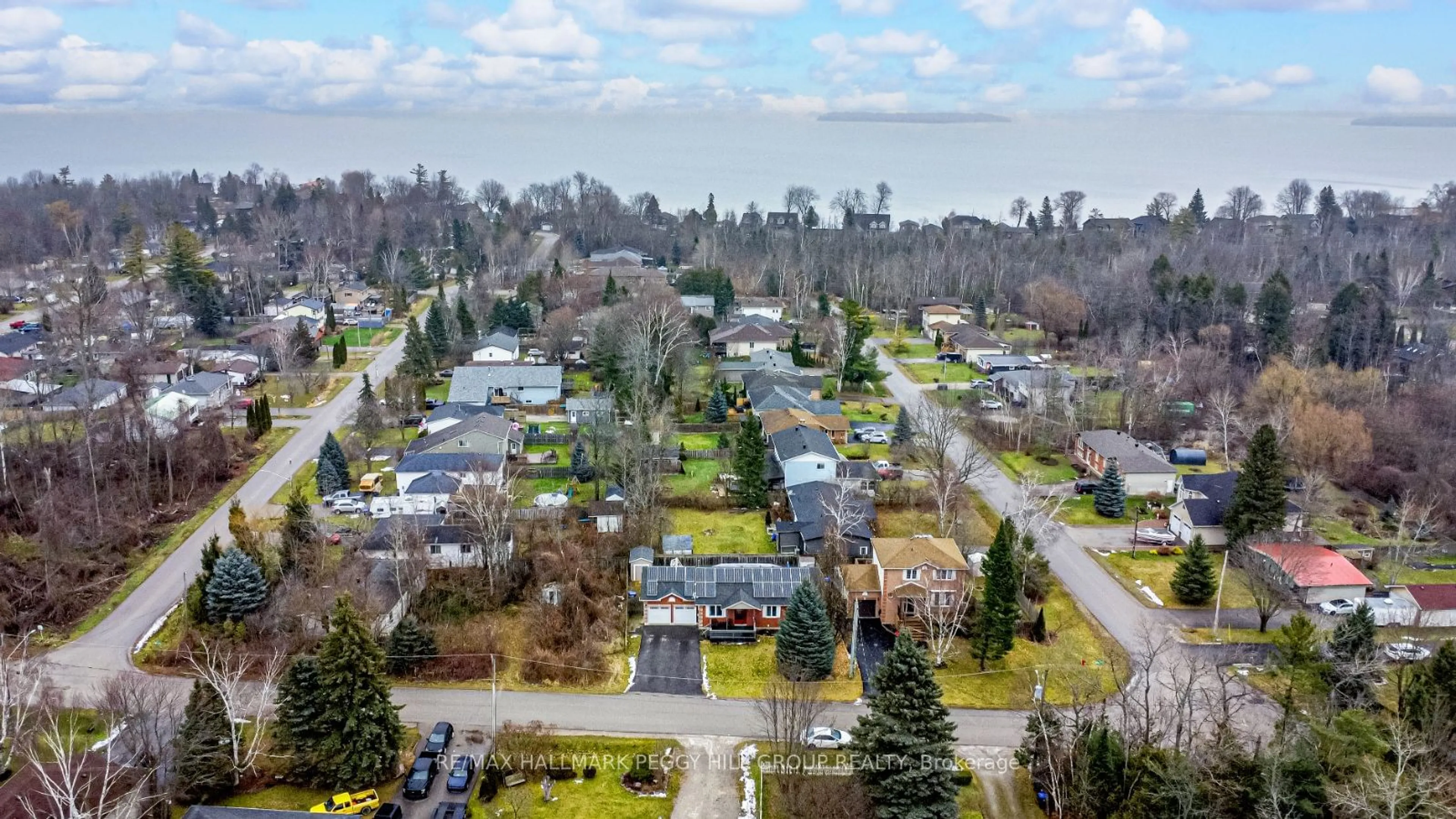 A pic from outside/outdoor area/front of a property/back of a property/a pic from drone, water/lake/river/ocean view for 2501 Holiday Way, Innisfil Ontario L9S 2H4