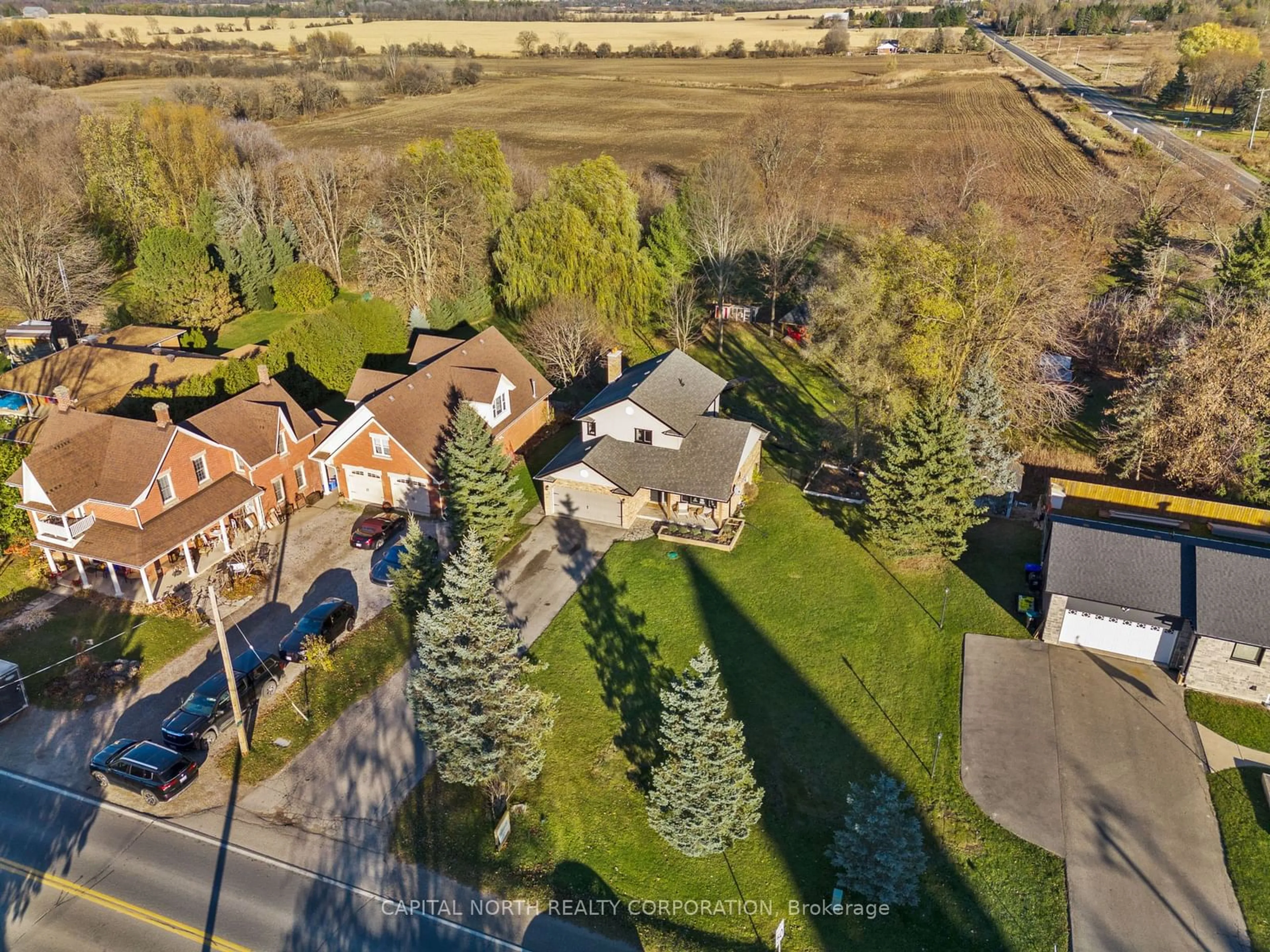 A pic from outside/outdoor area/front of a property/back of a property/a pic from drone, street for 2125 Adjala Tecumseth Townline, New Tecumseth Ontario L0G 1W0